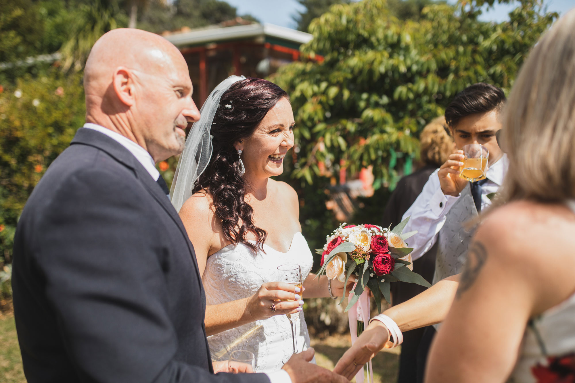 bride and groom mingling