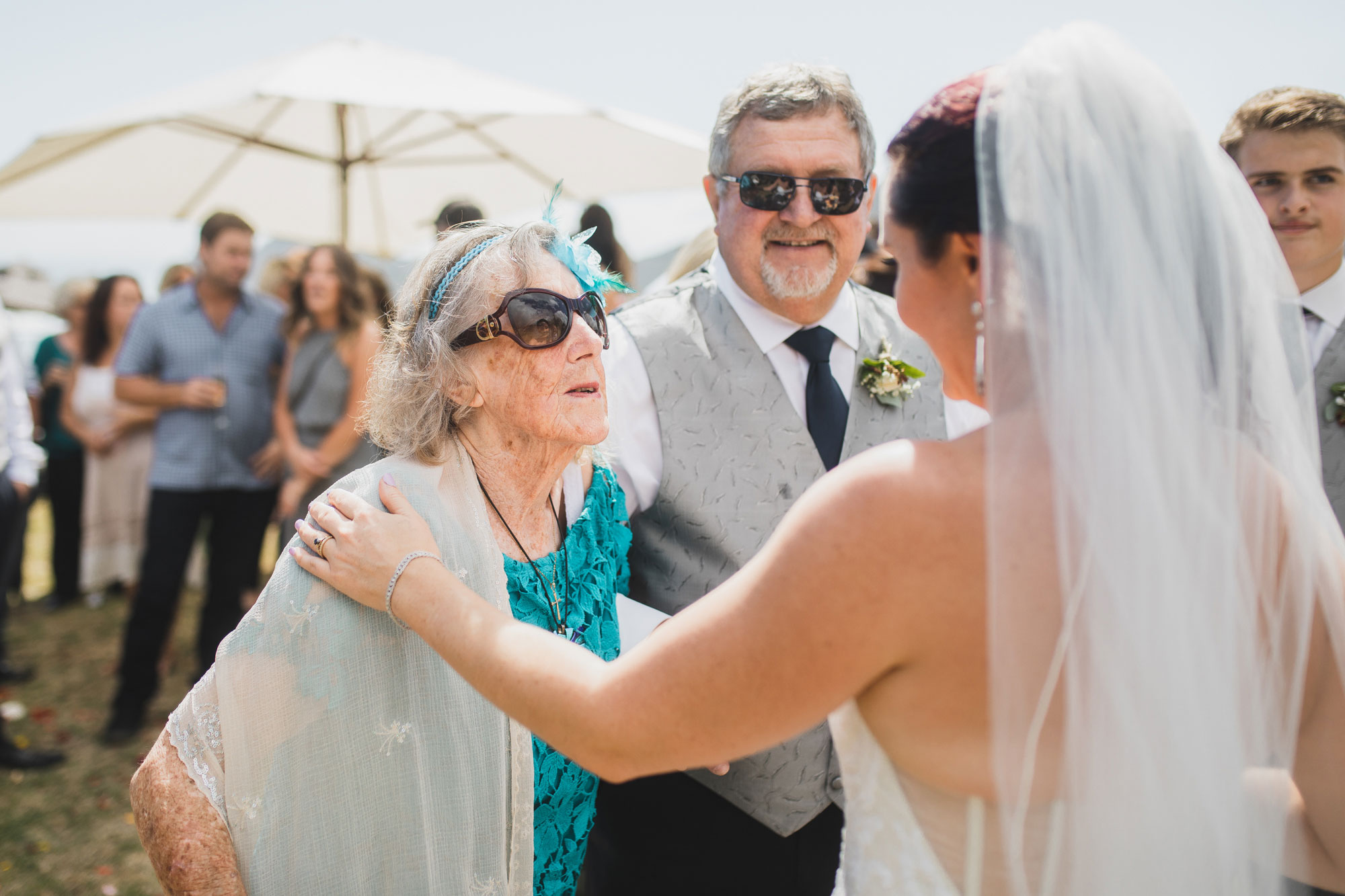 guest chatting with the bride