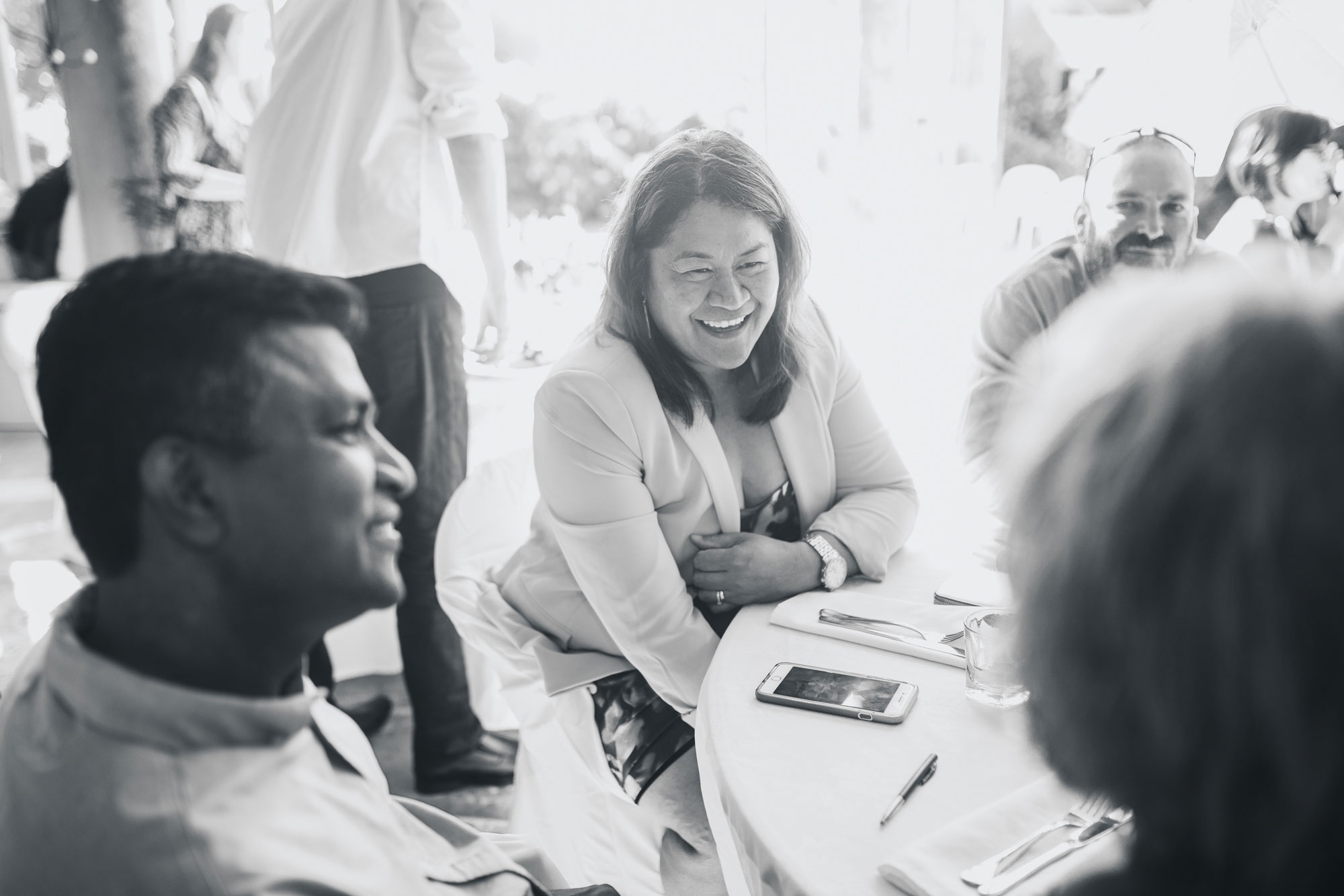 wedding guest laughing