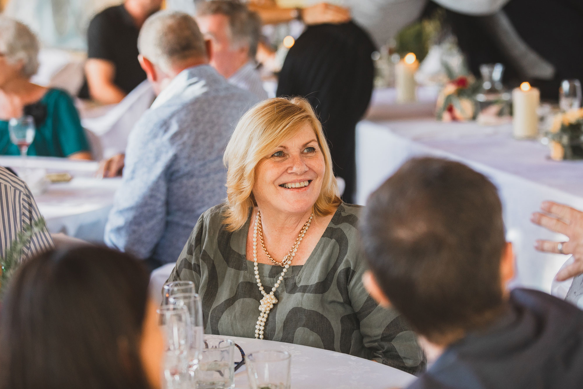 wedding guest smiling