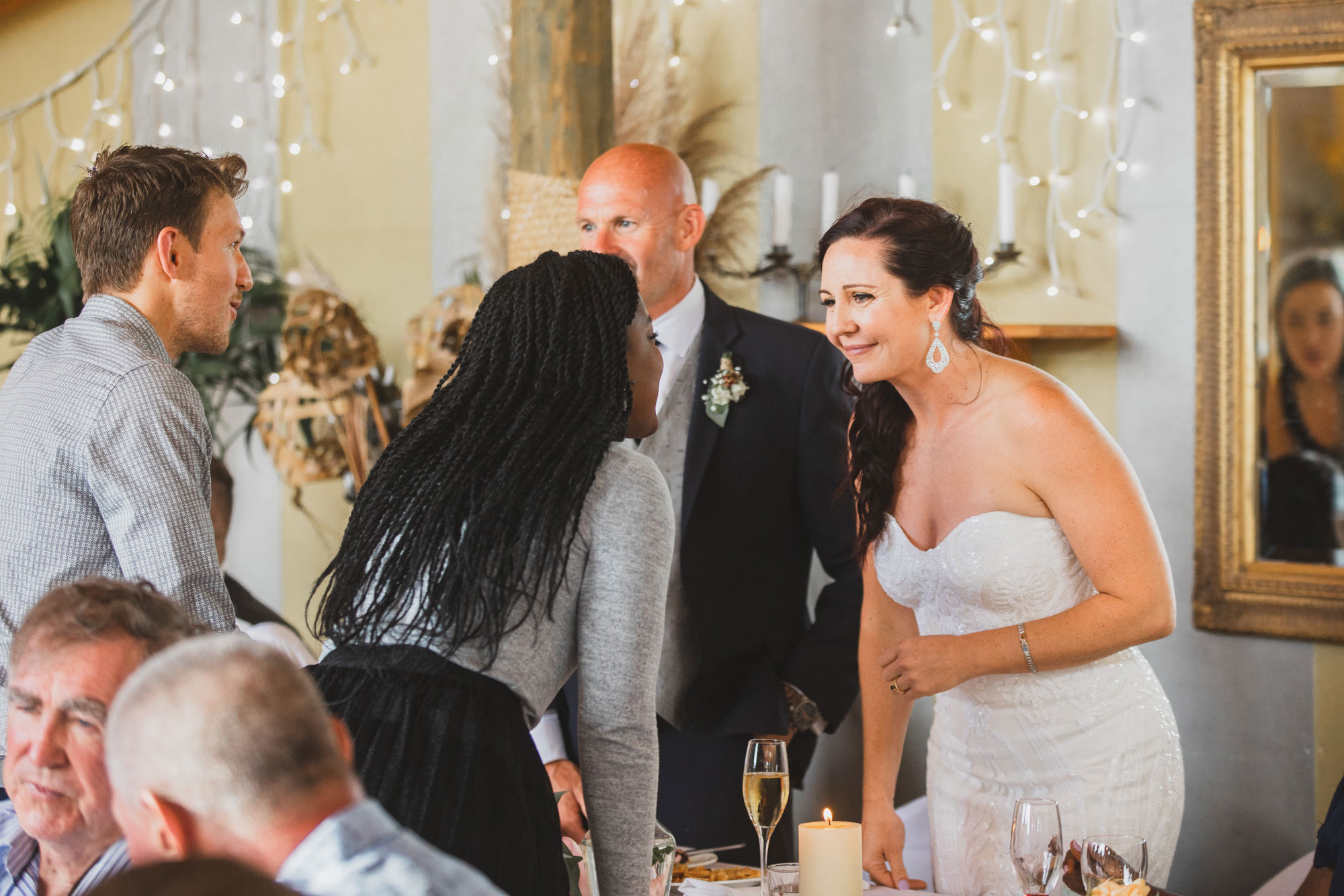 bride smiling at reception