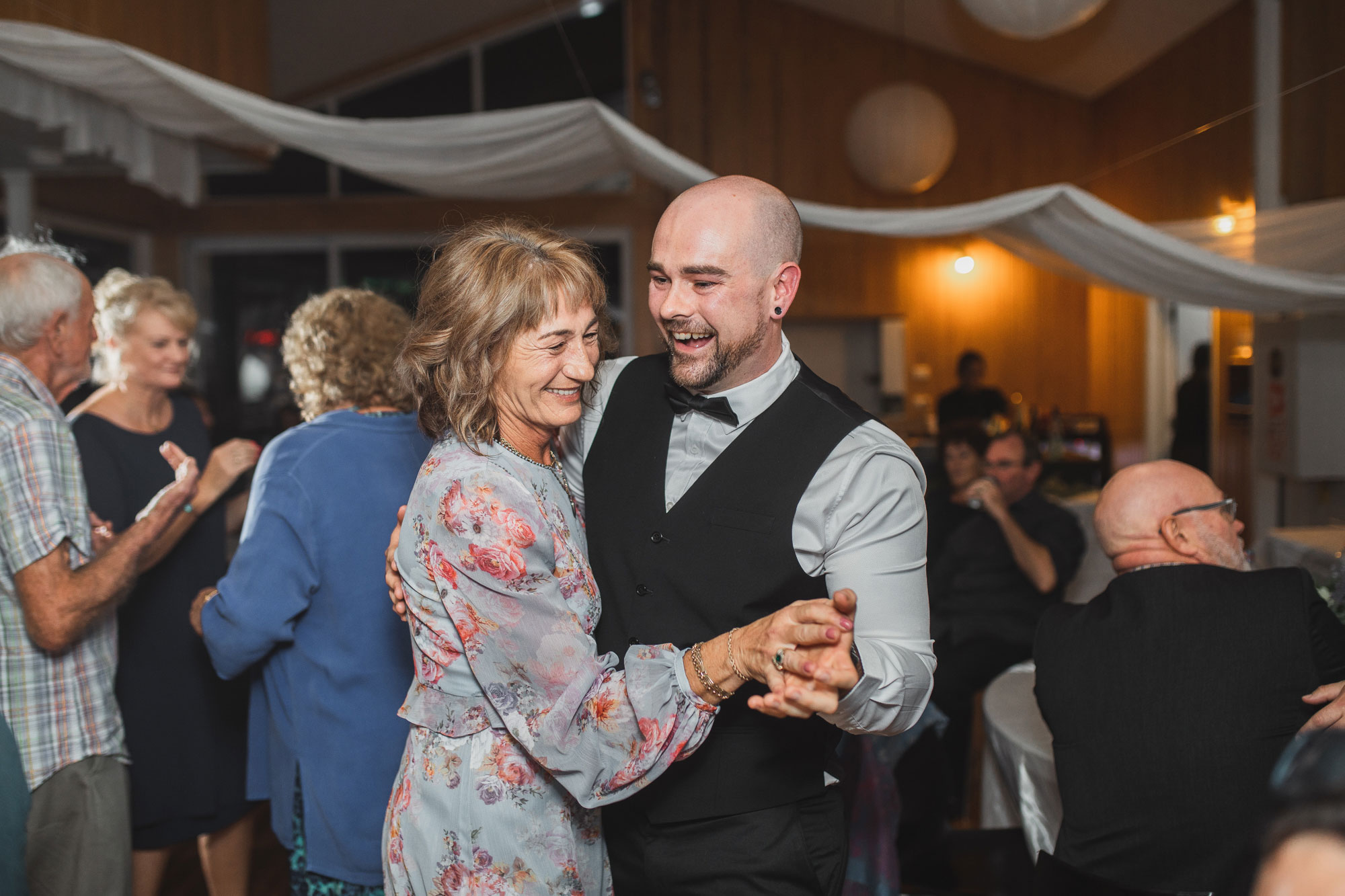 groom on dance floor