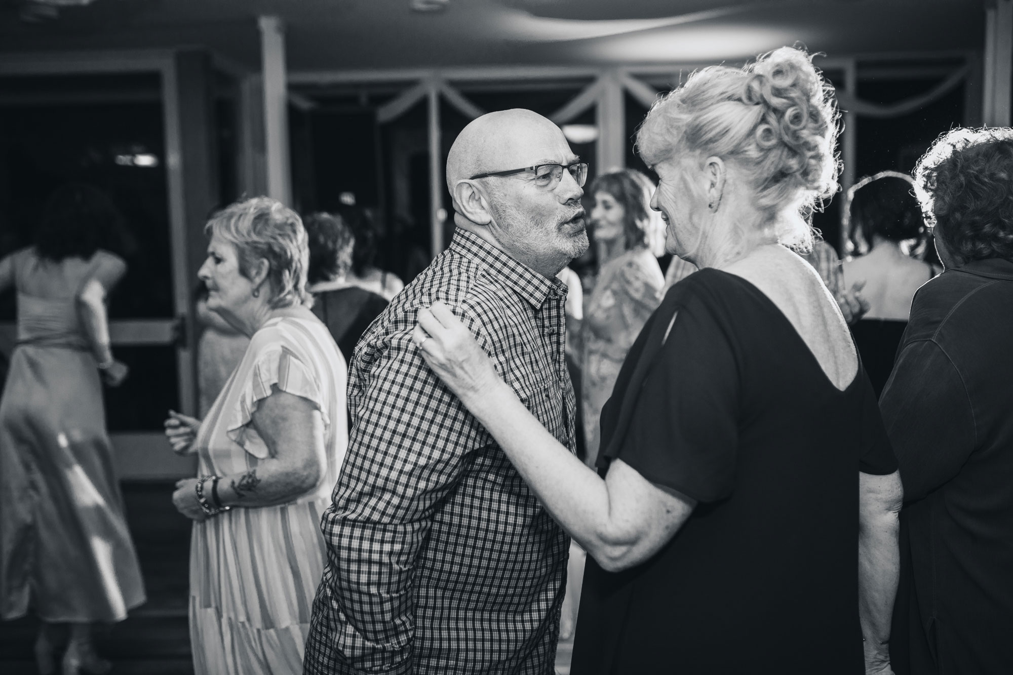 wedding guests having fun on dance floor