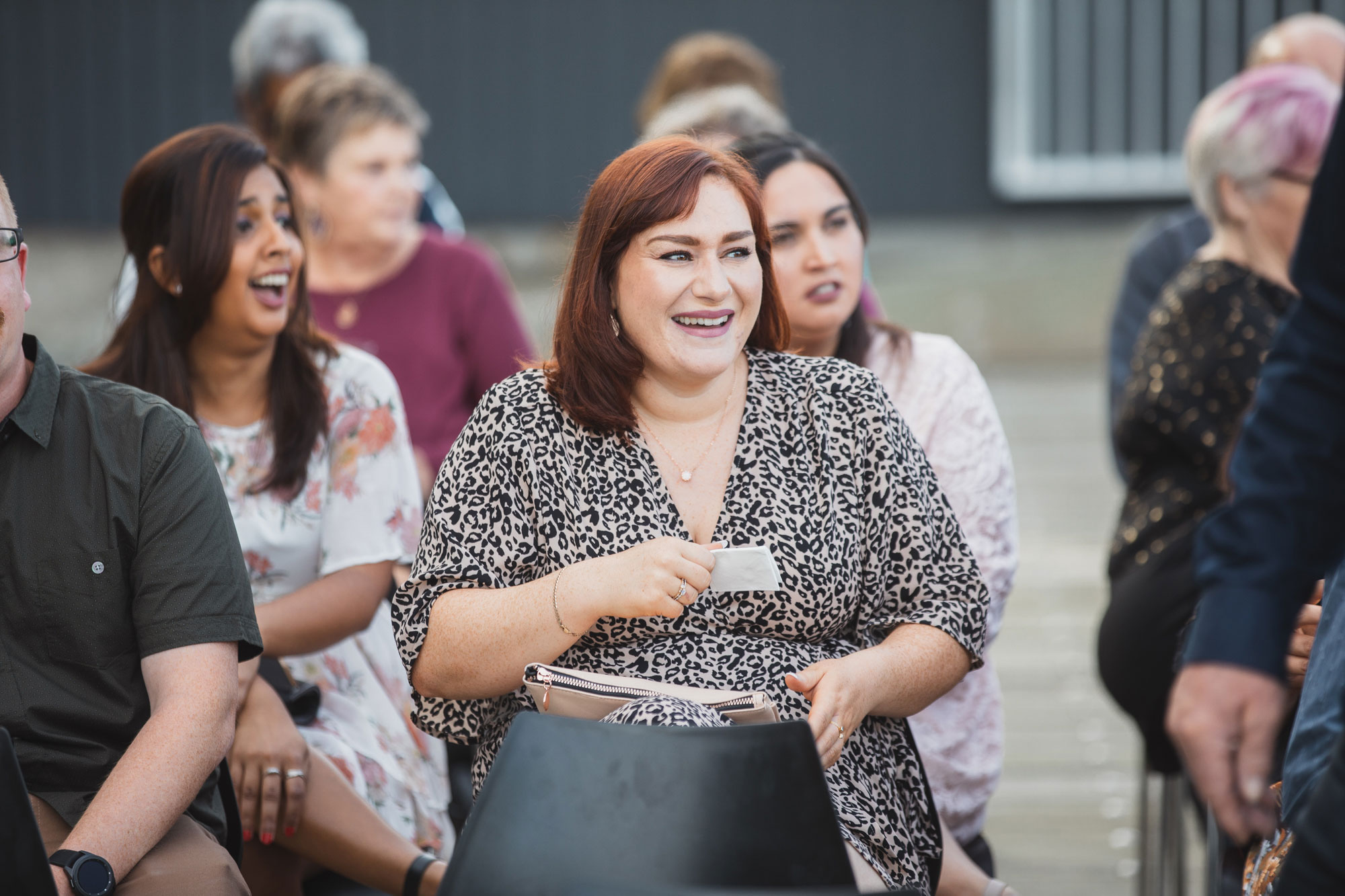 wedding guest laughing