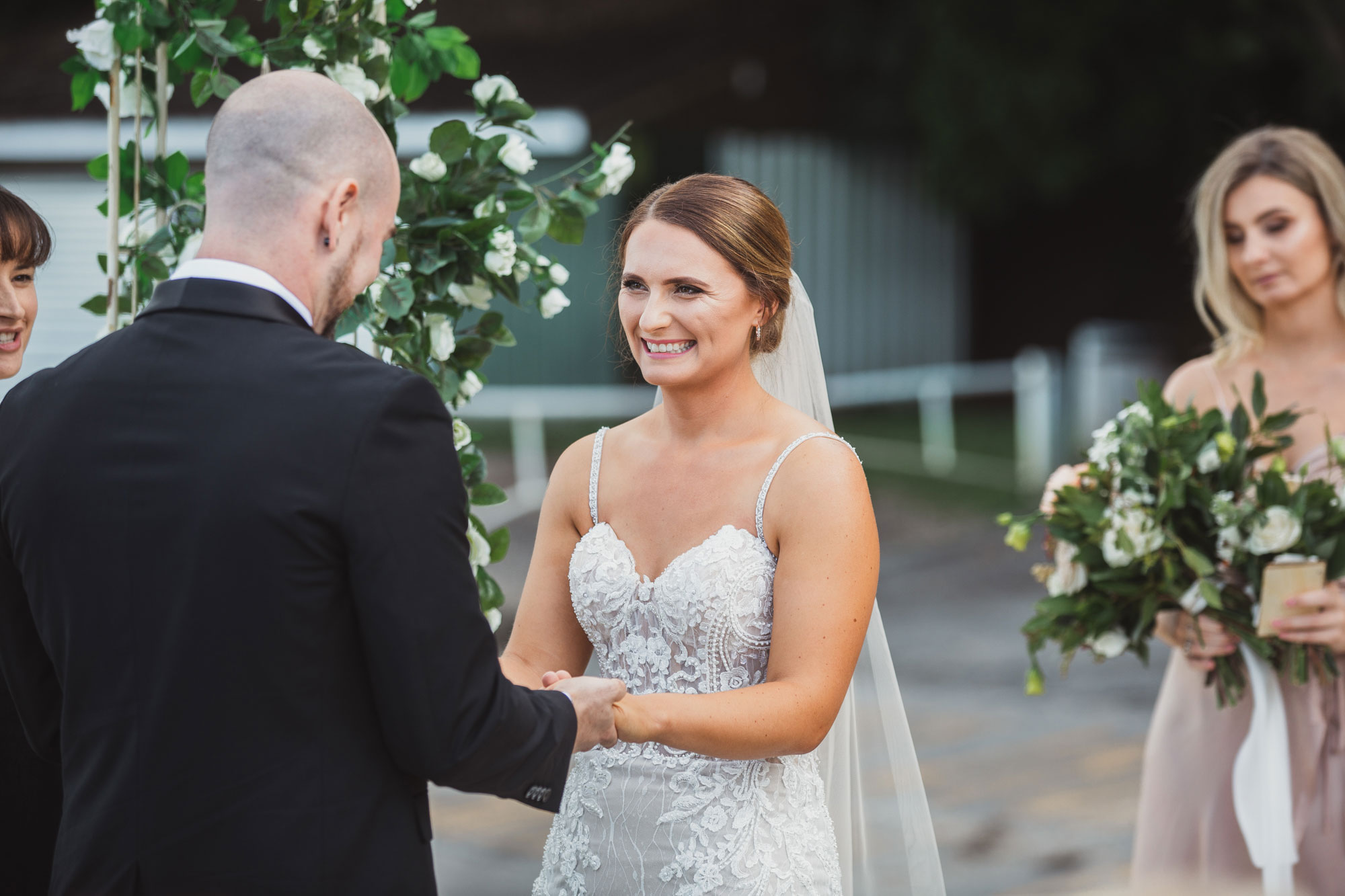 bride smiling at the groom