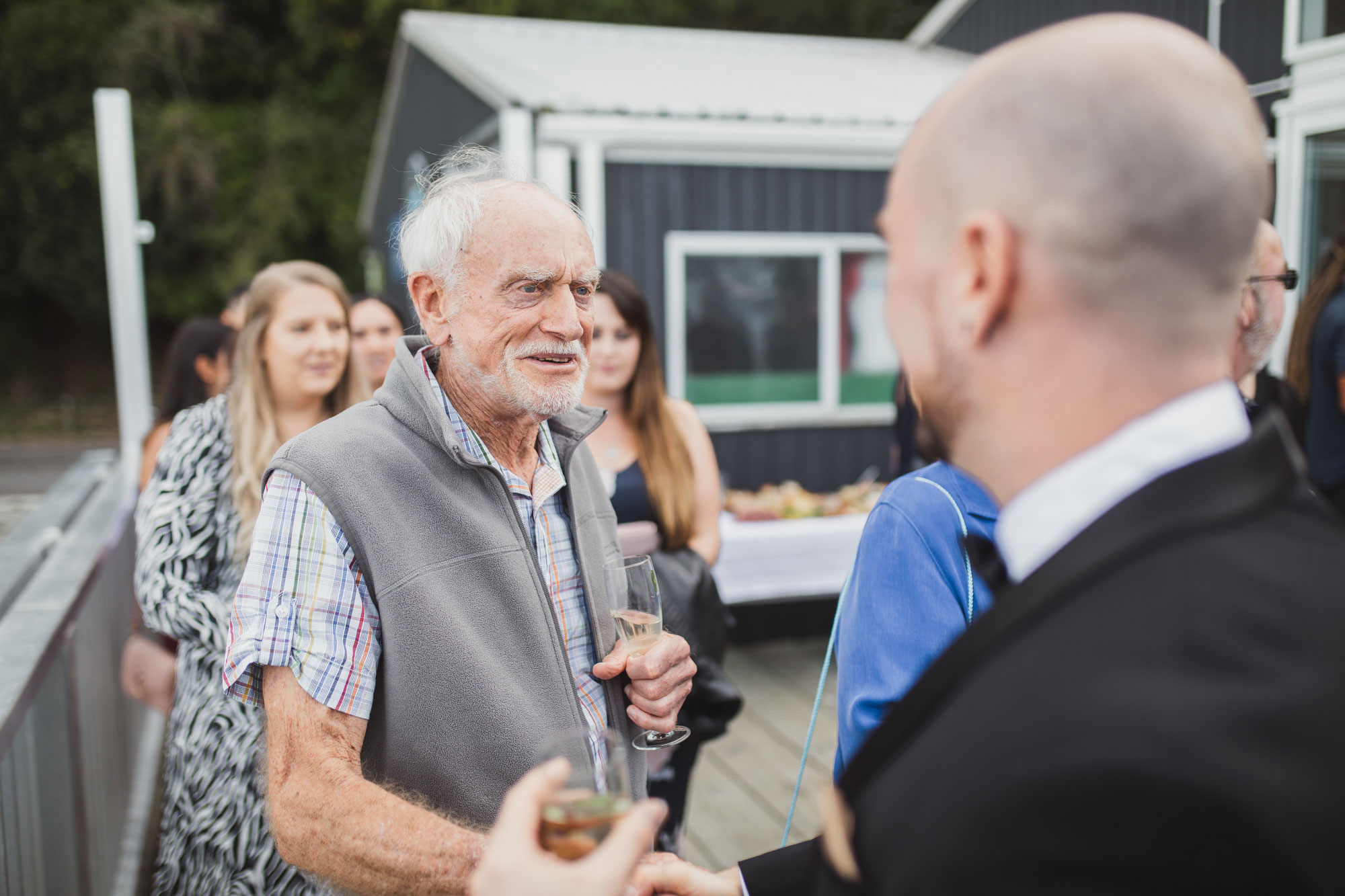 wedding guest celebrating groom