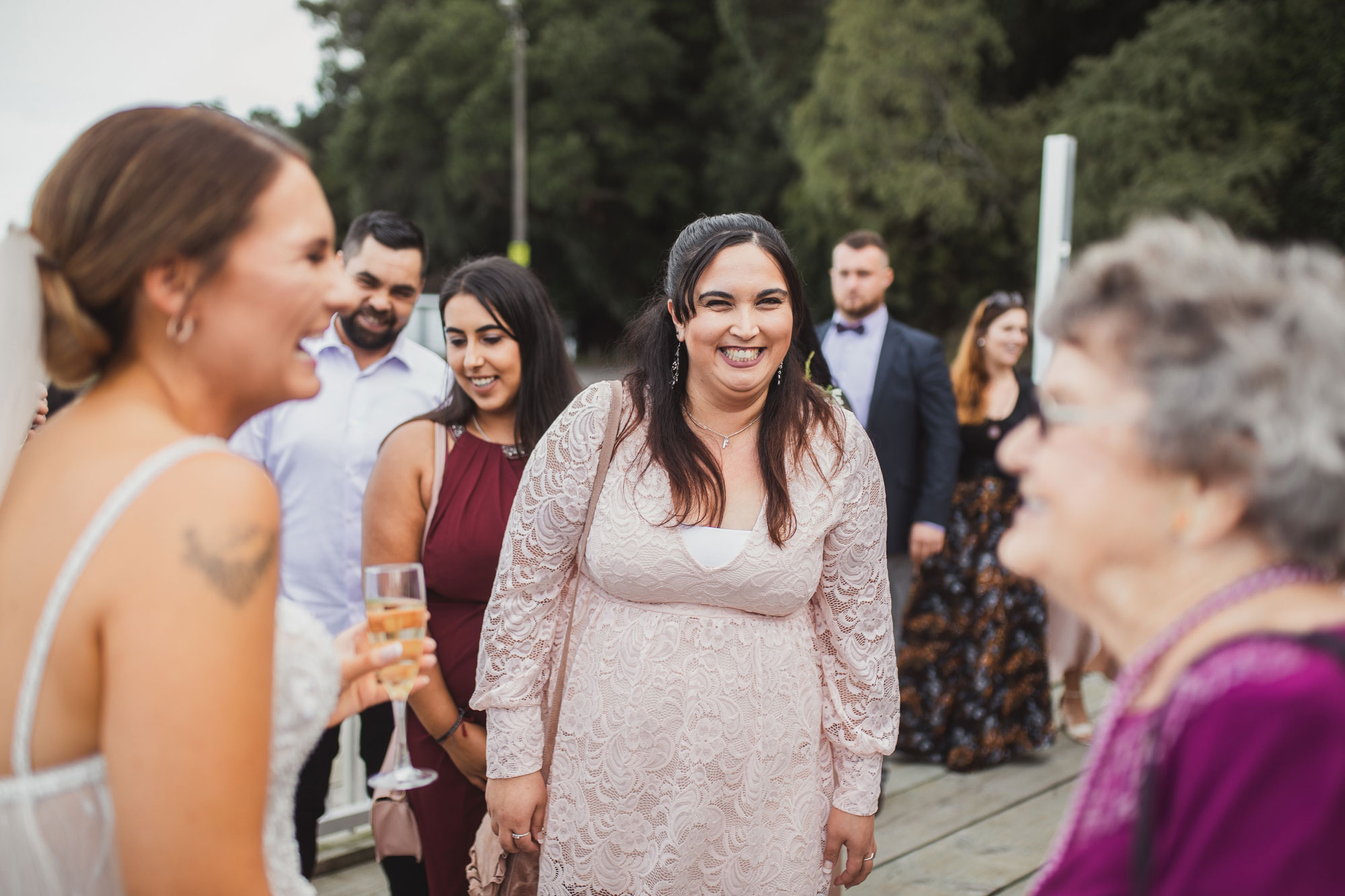 wedding guest smiling