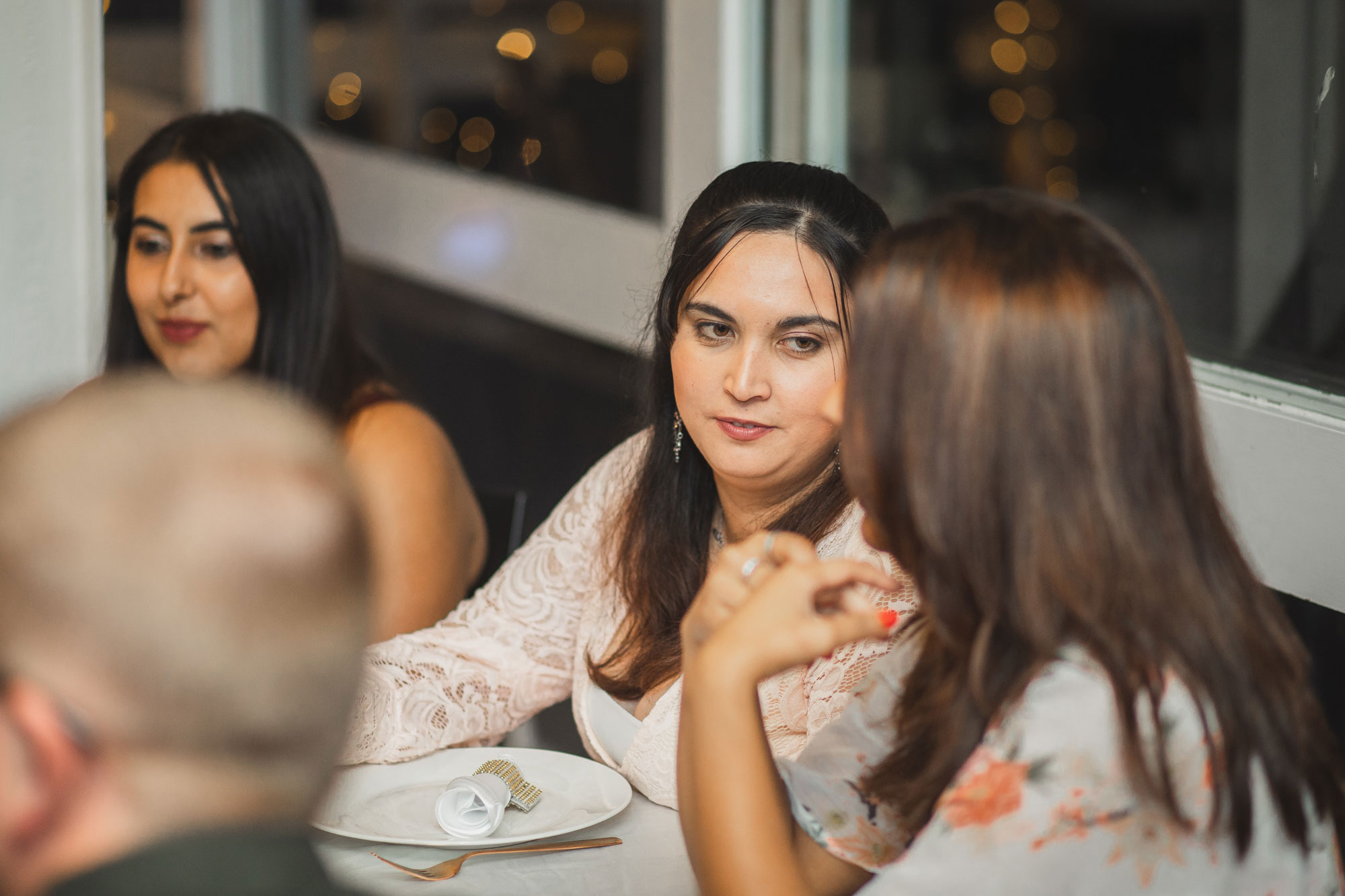 wedding guests talking