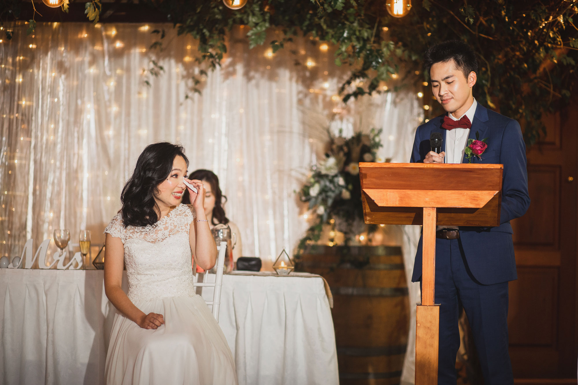 bride emotional during groom speech