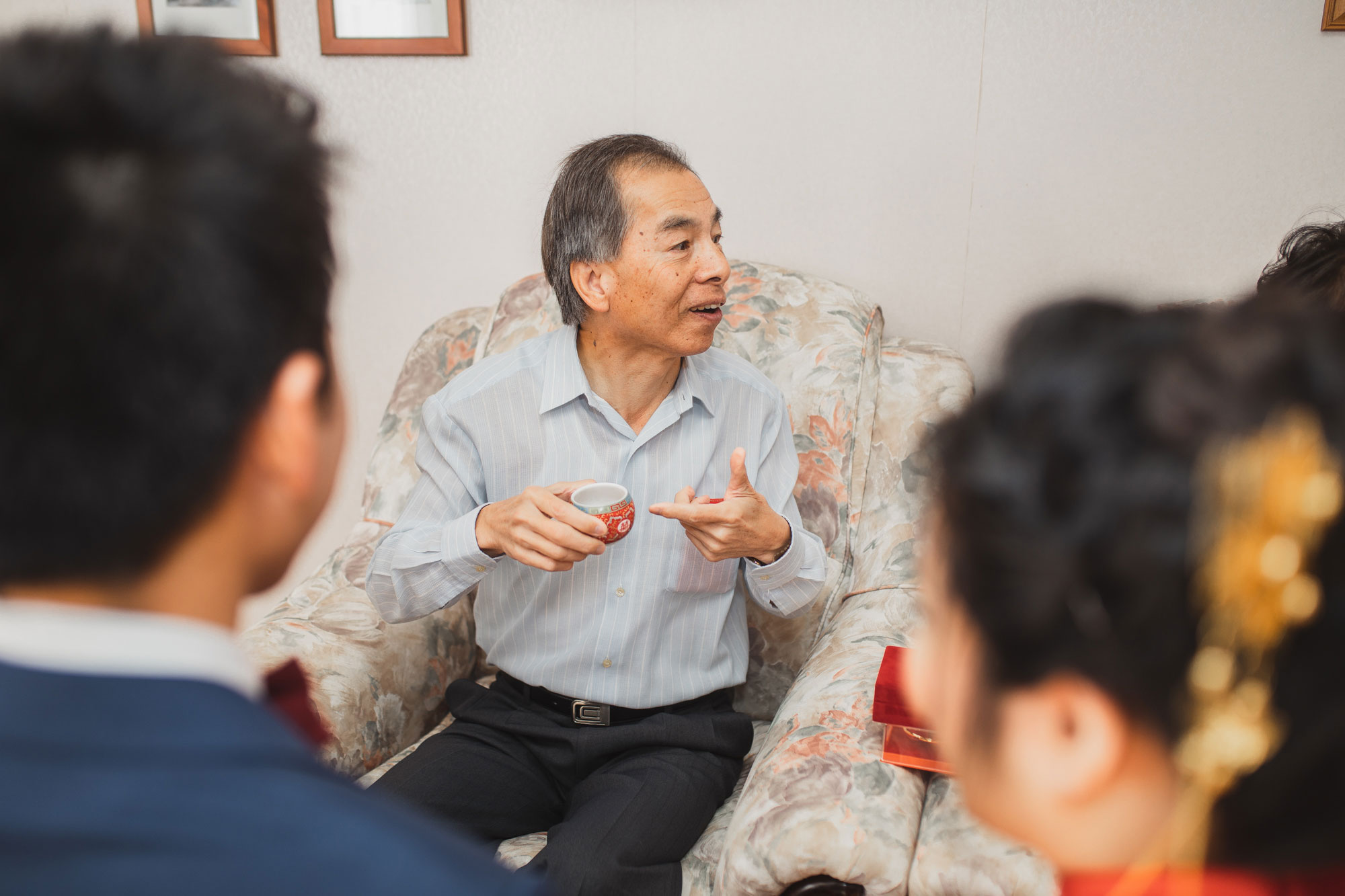 uncle of the bride drinking tea