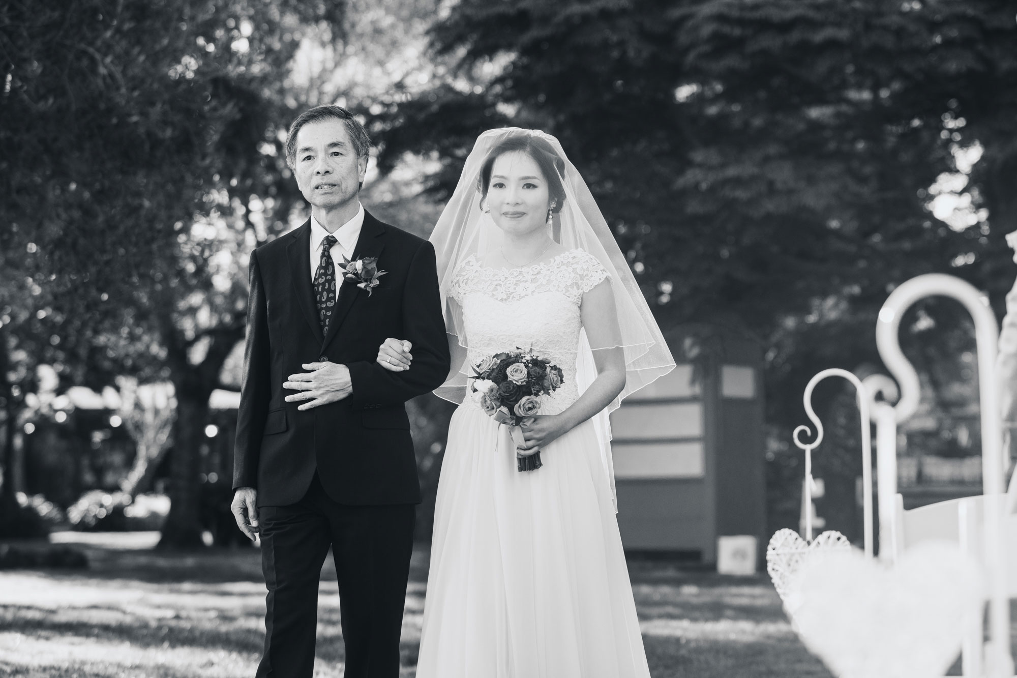 bride walking down the aisle with father