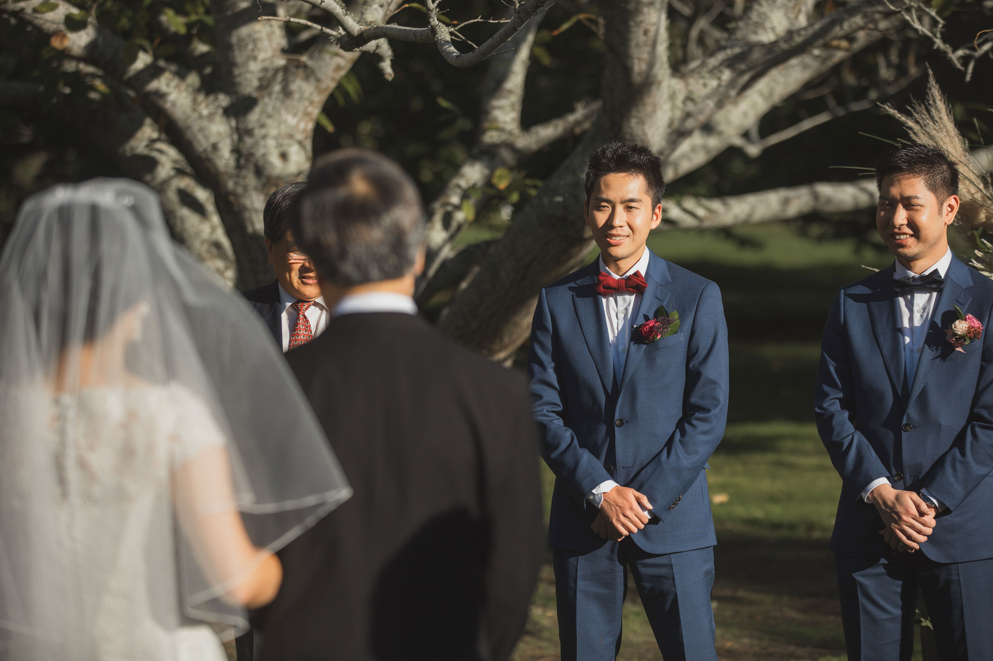 groom reaction to bride at the ceremony