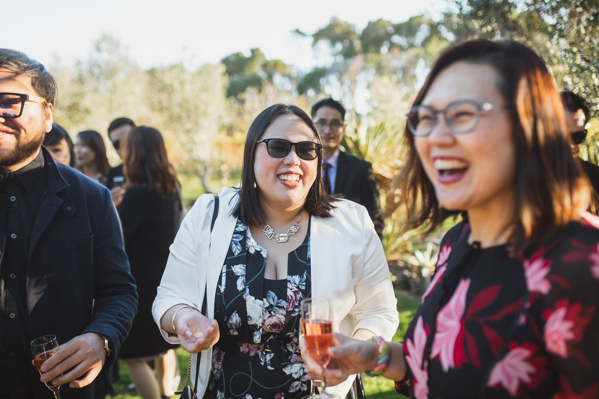 wedding guests laughing