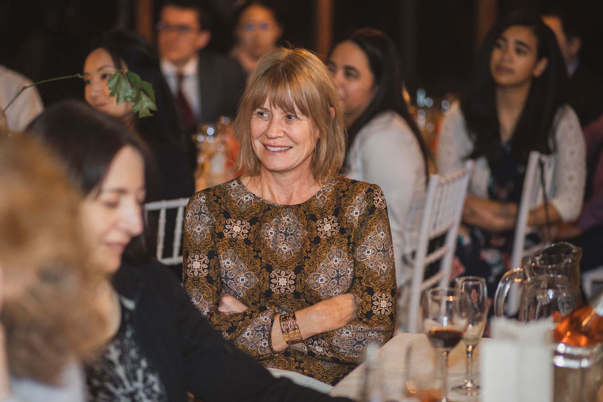 wedding guests laughing during speech