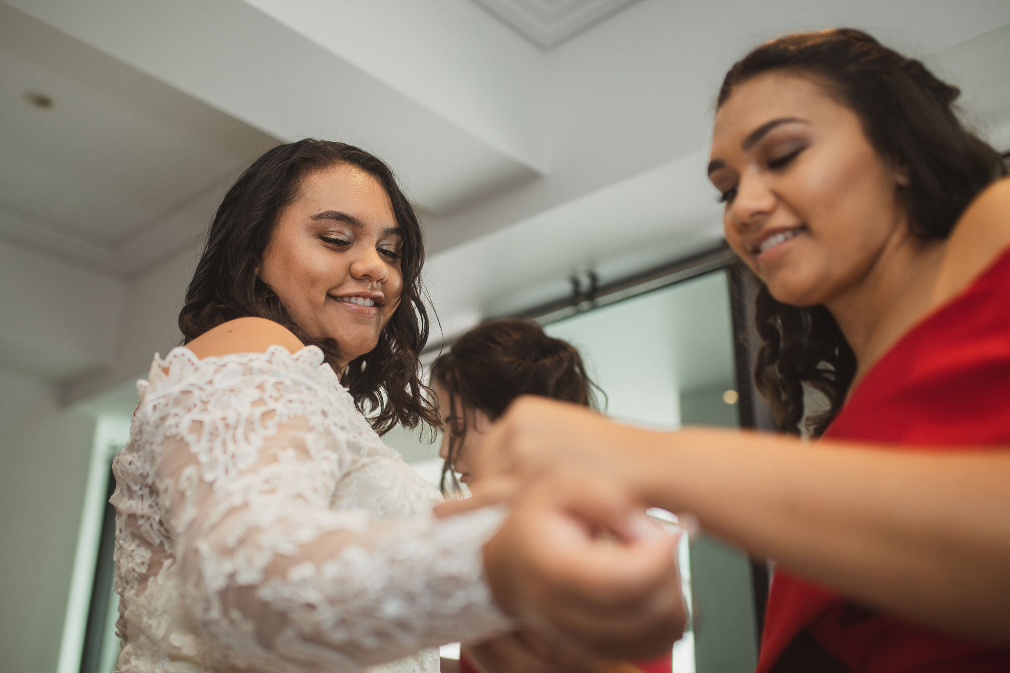 bride adjusting her dress