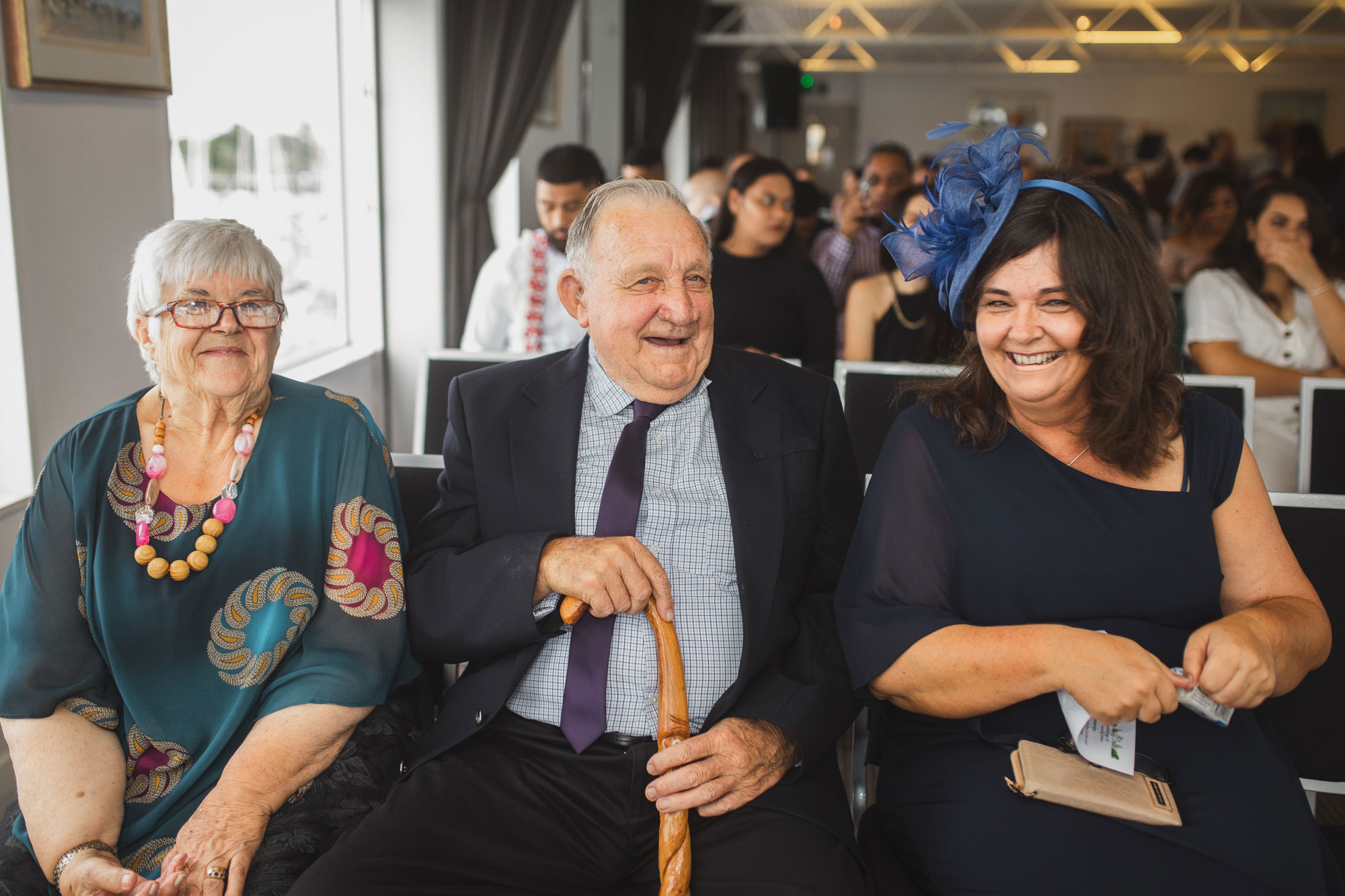 family of the bride and groom laughing