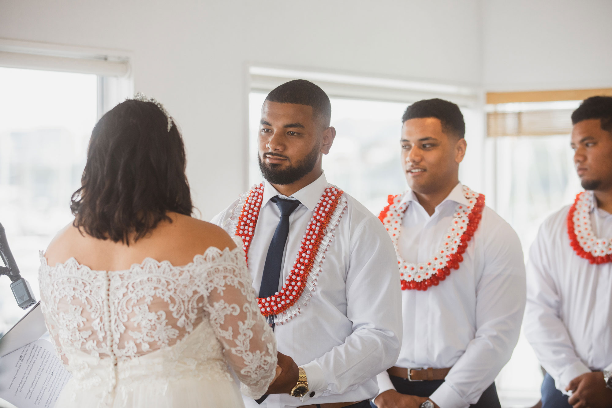 groom looking at the bride during wedding ceremony