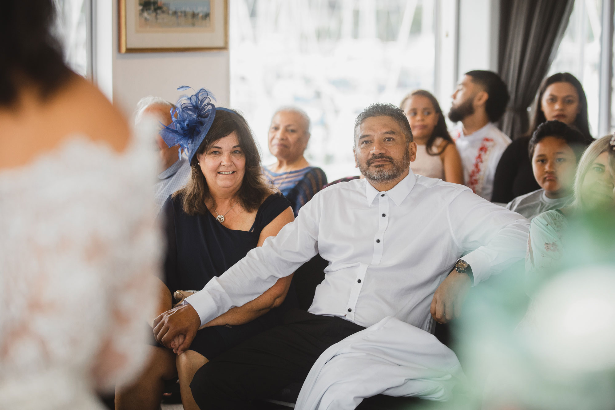 father of the bride looking at her during ceremony