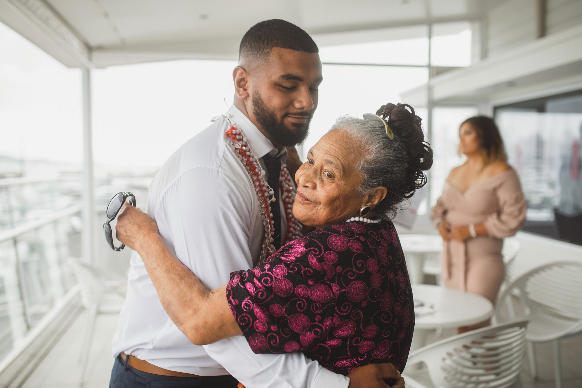 grandma hugging the groom