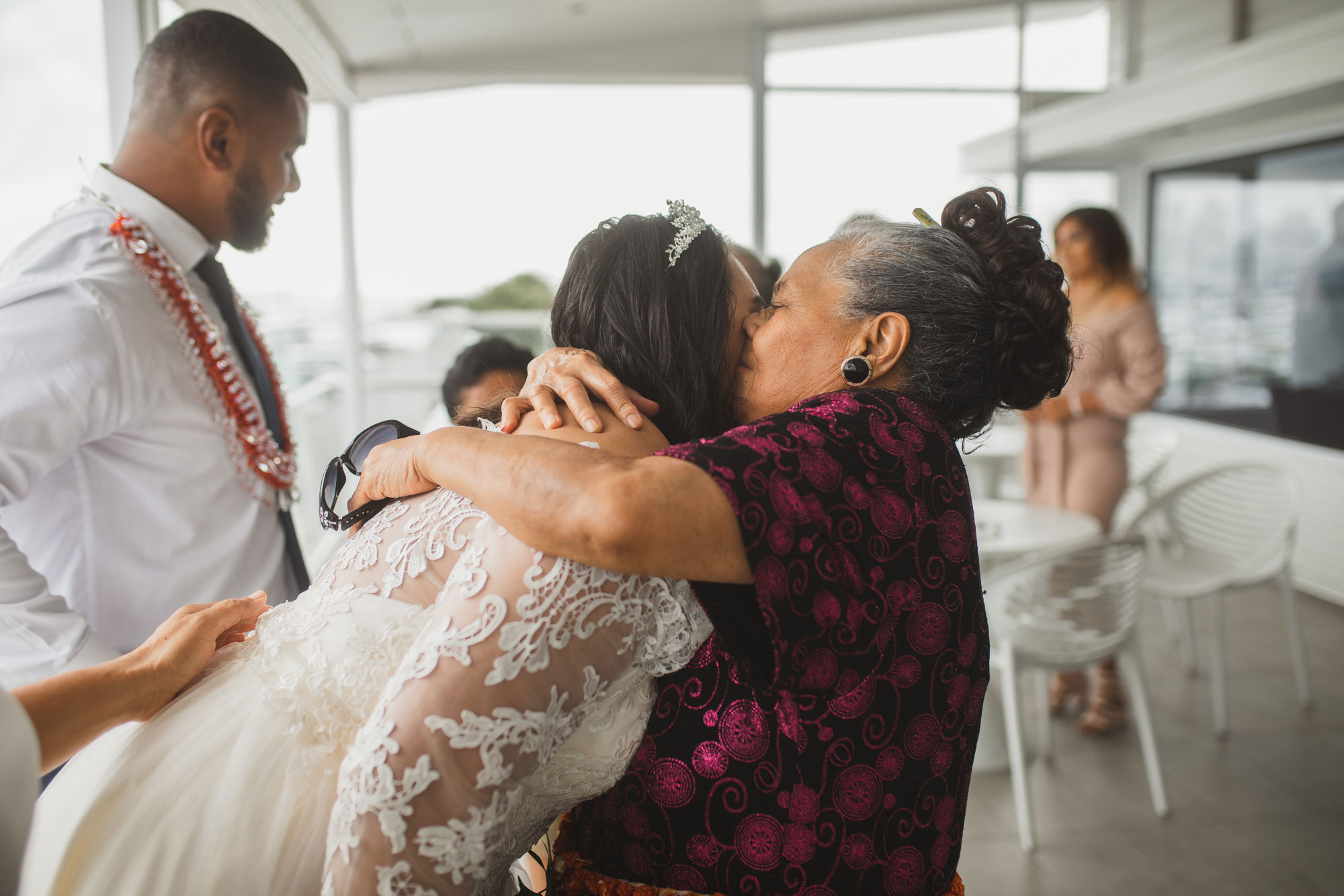 grandma hugging the bride