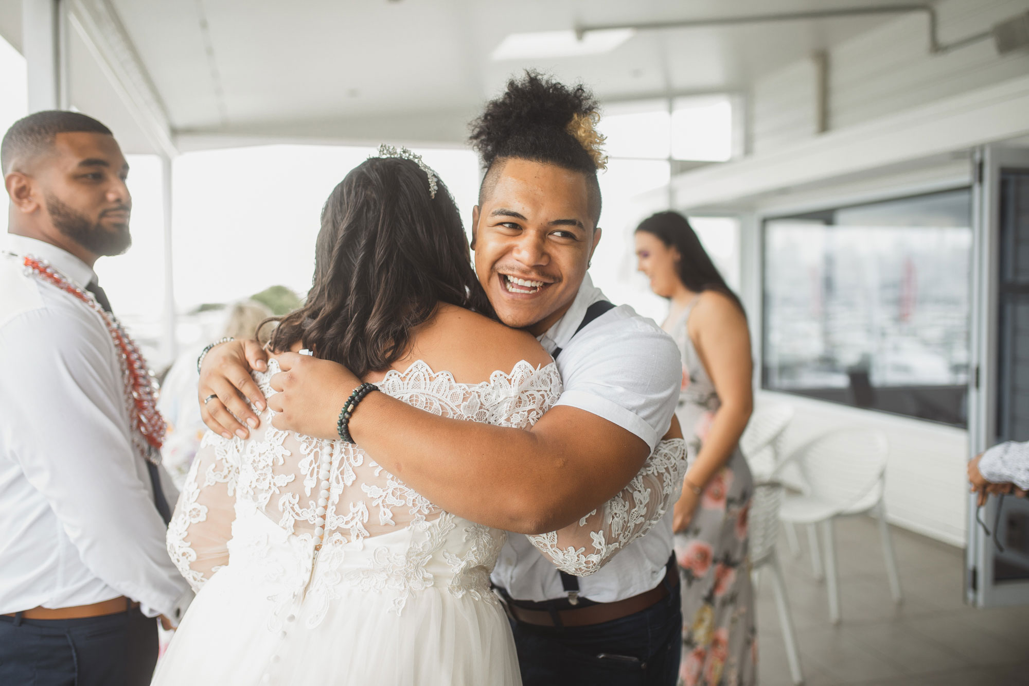 wedding guest and the bride share a moment