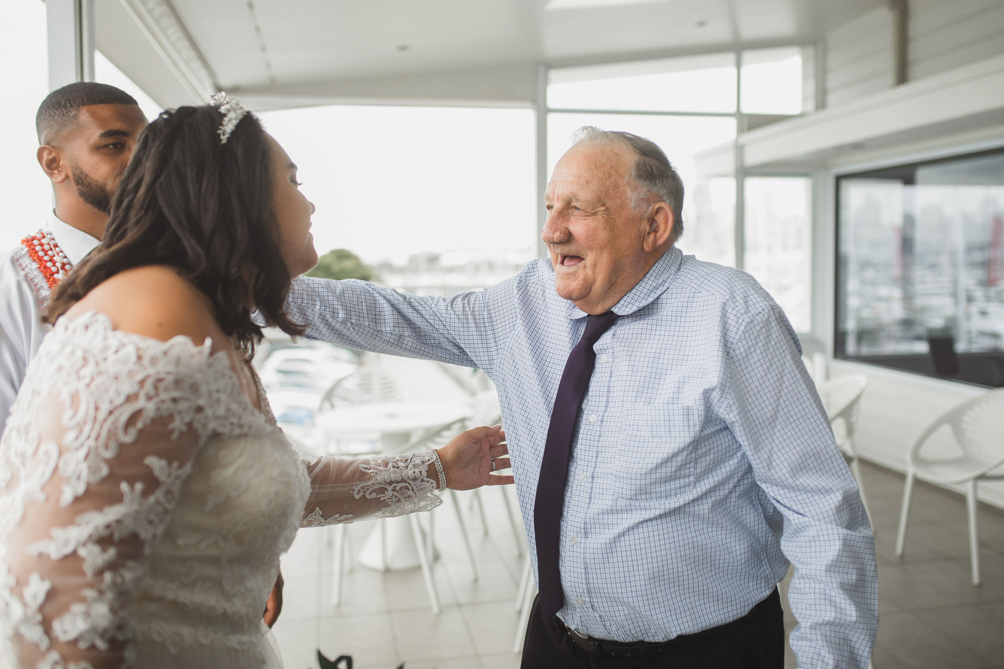 guests hugging the bride