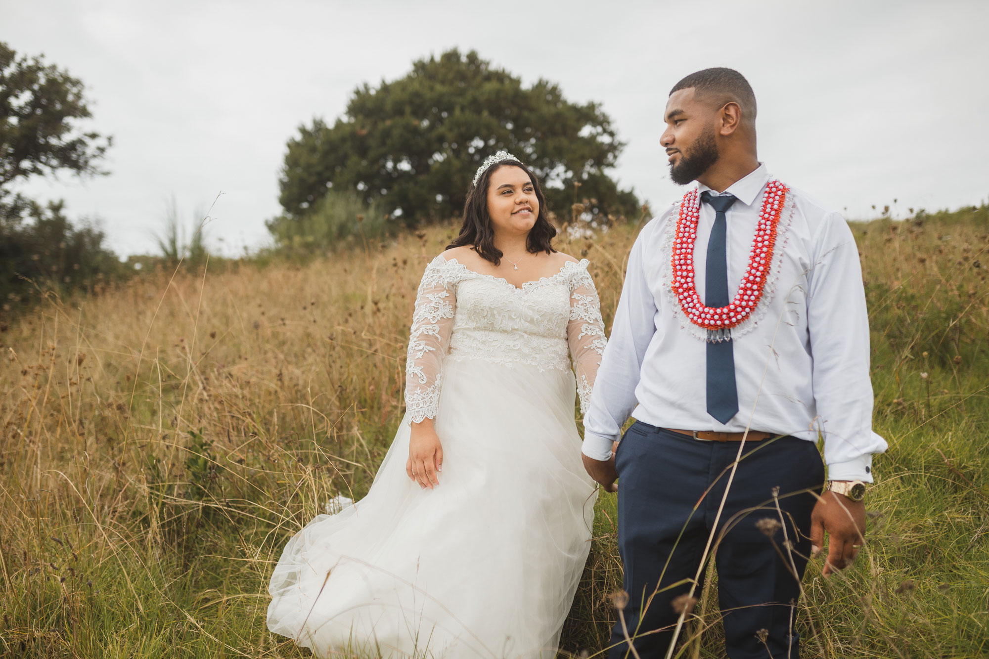 bride and groom romantic moment in big field