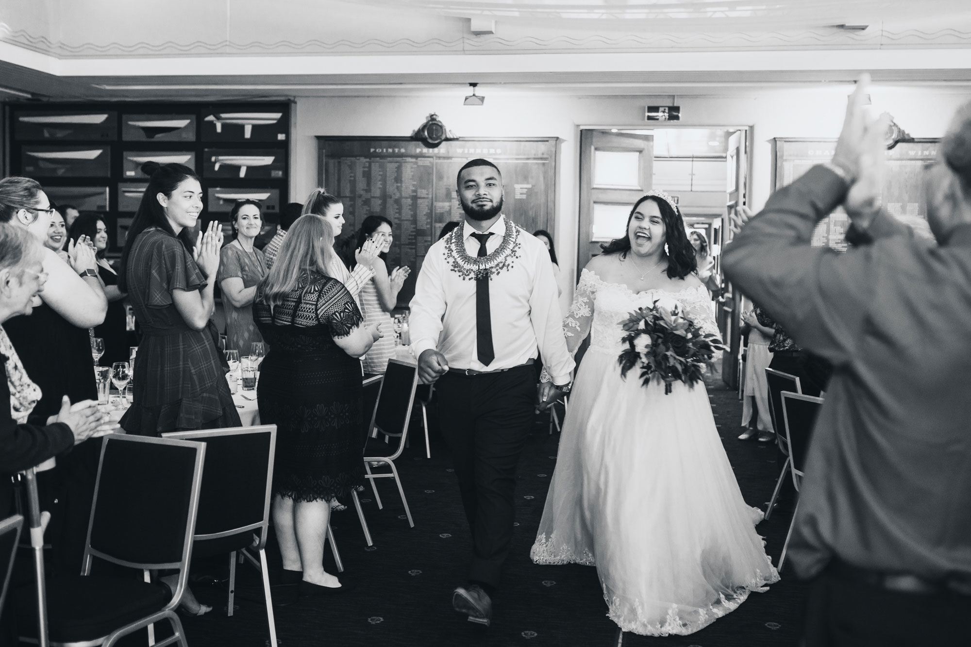 bride and groom entrance to reception at royal yacht squadron