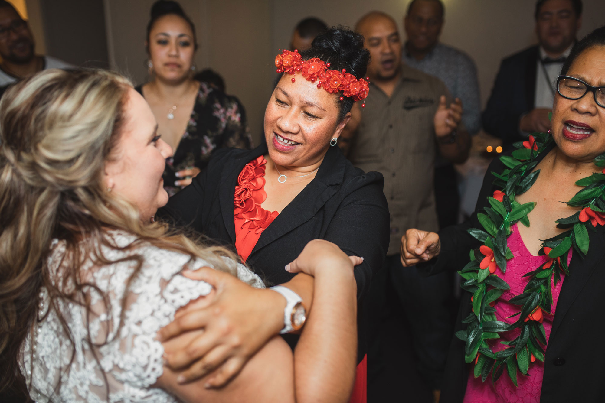 wedding guest hugging the bride