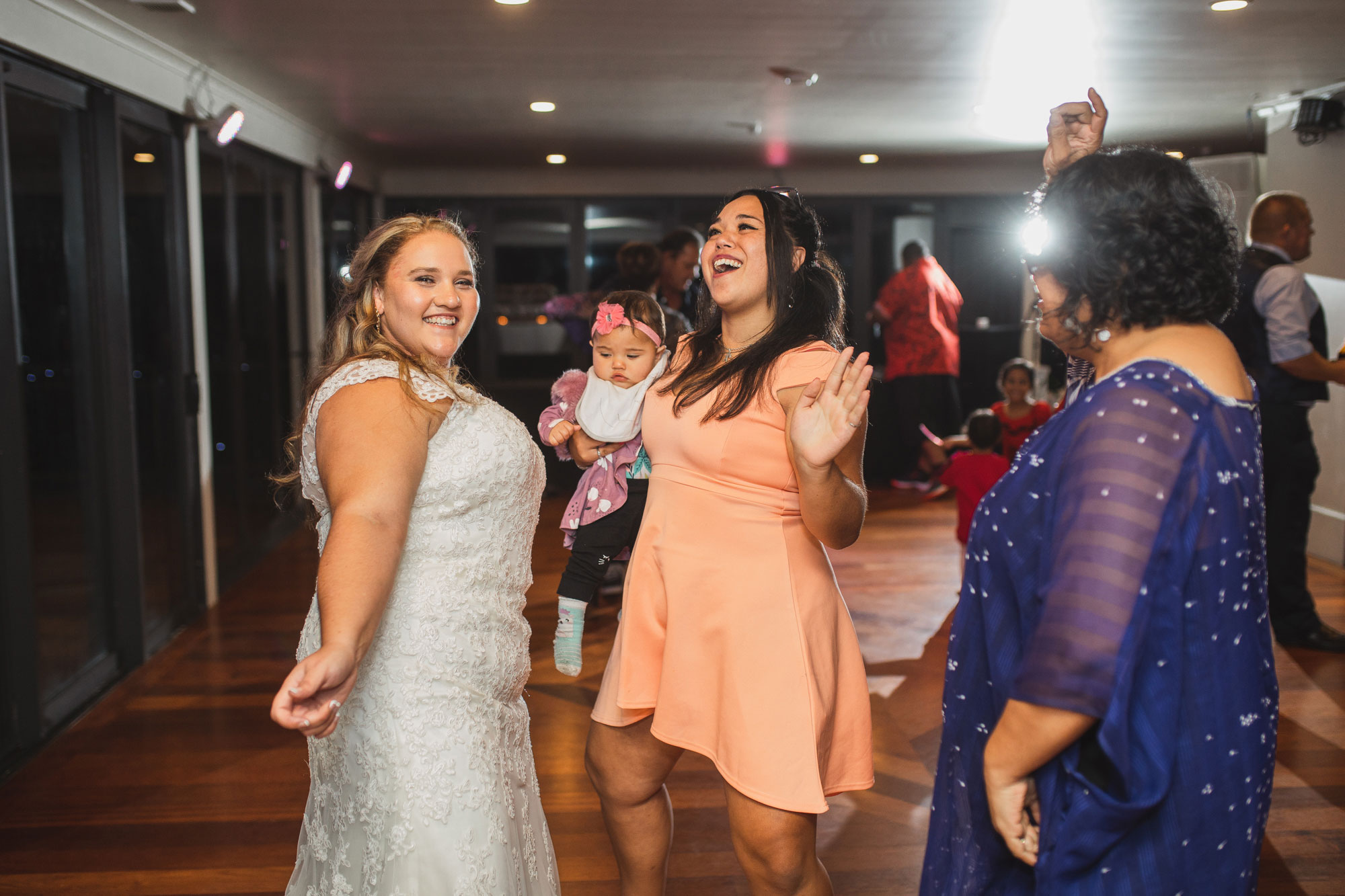 bride and guests on the dance floor