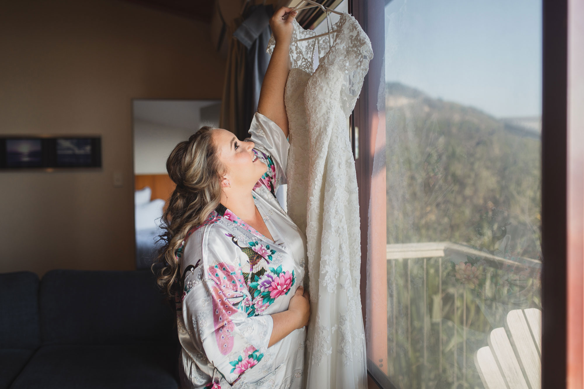 bride looking at her dress