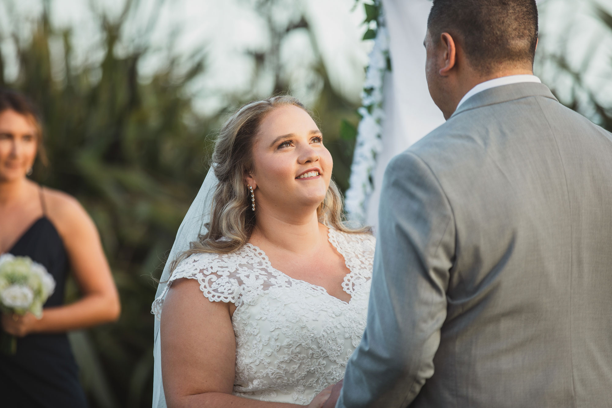 bride looking at the groom