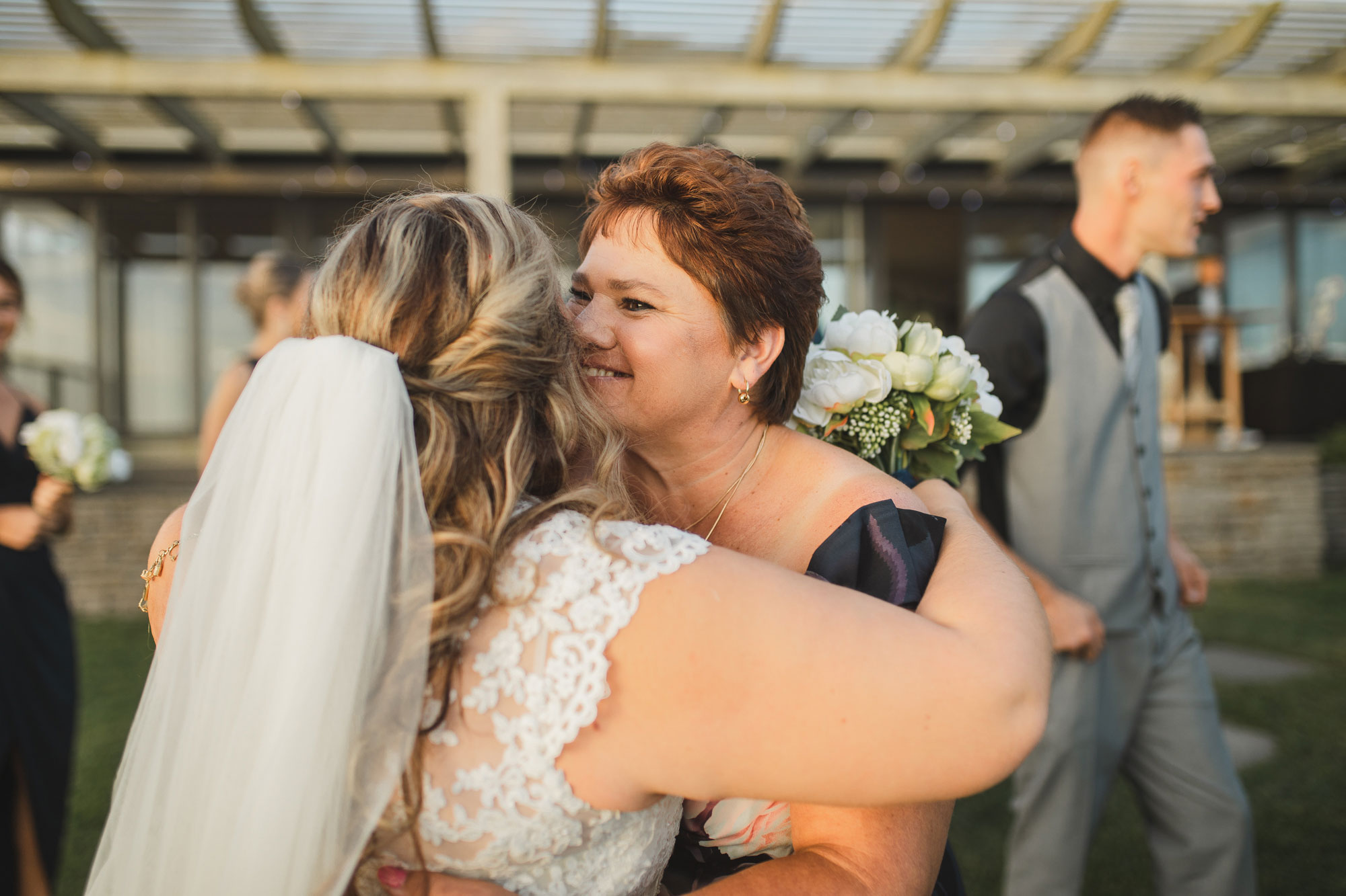 mother and the bride hugging