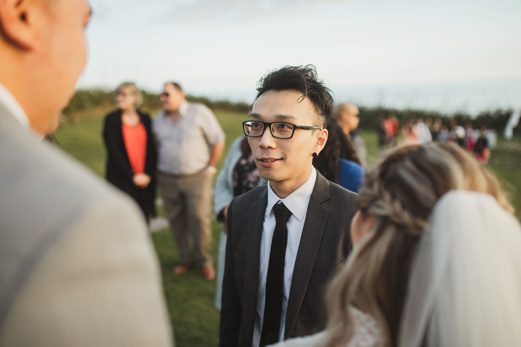 wedding guest talking to the groom