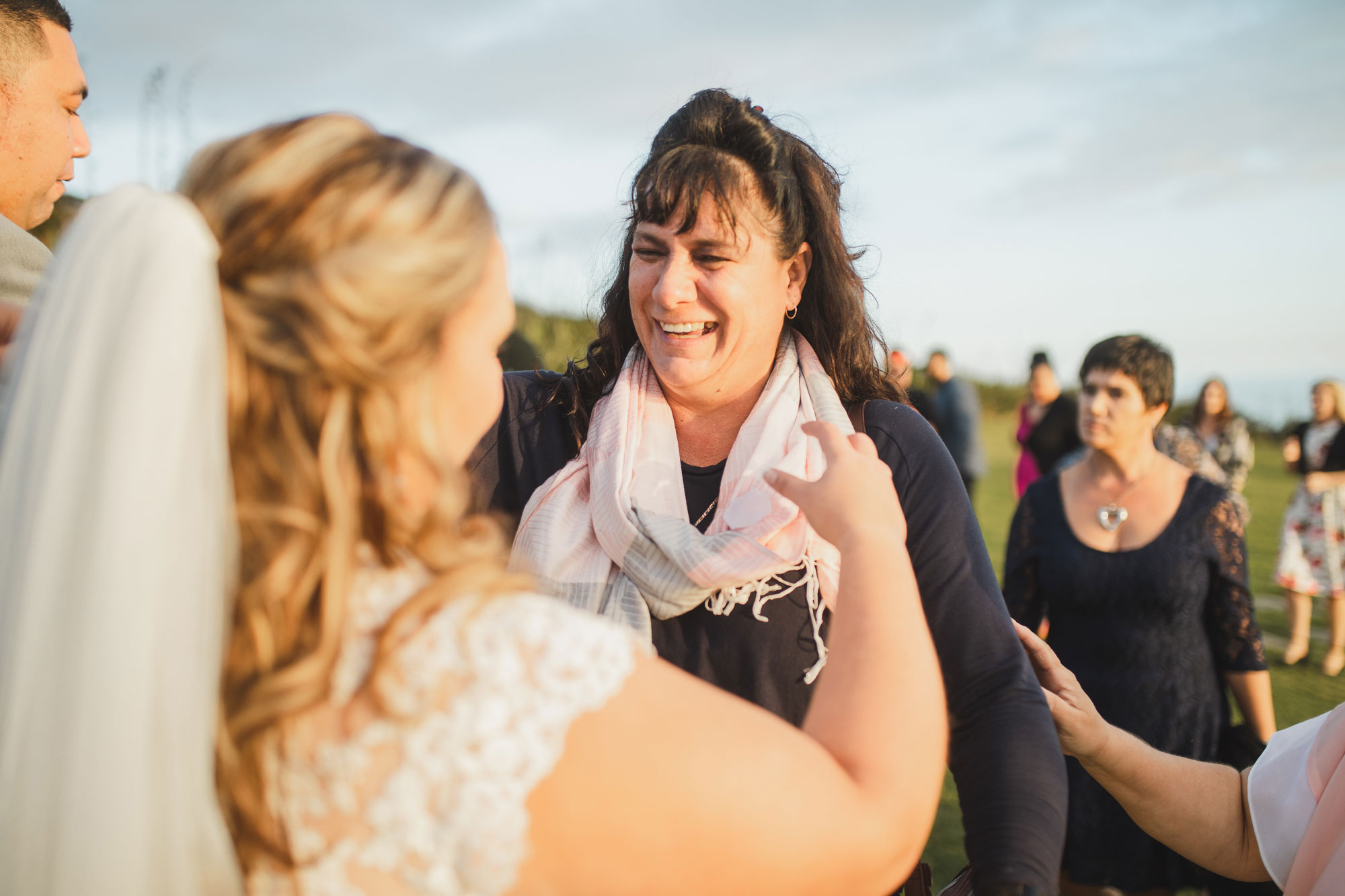 wedding guest smiling at the bride