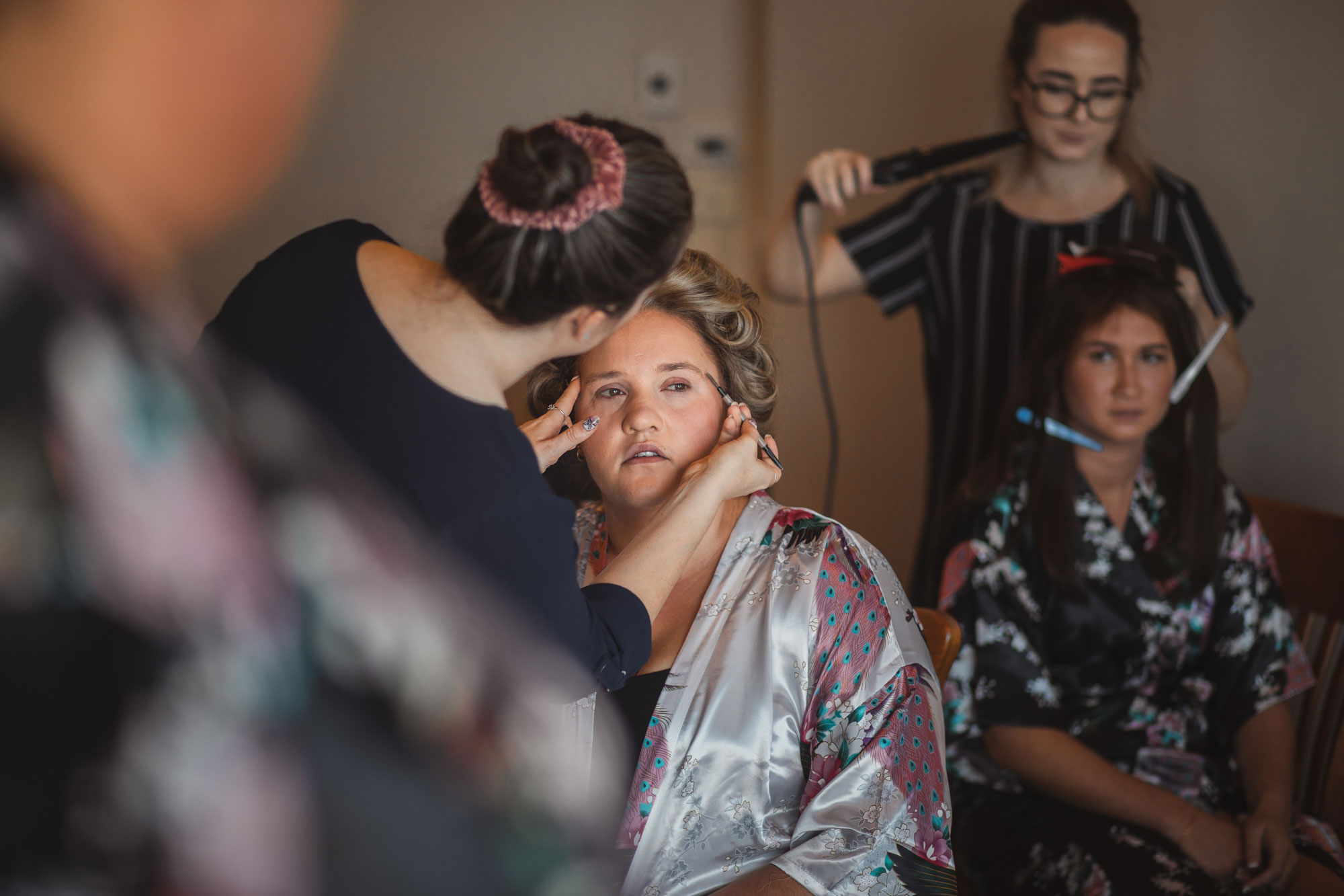 bride putting on make up