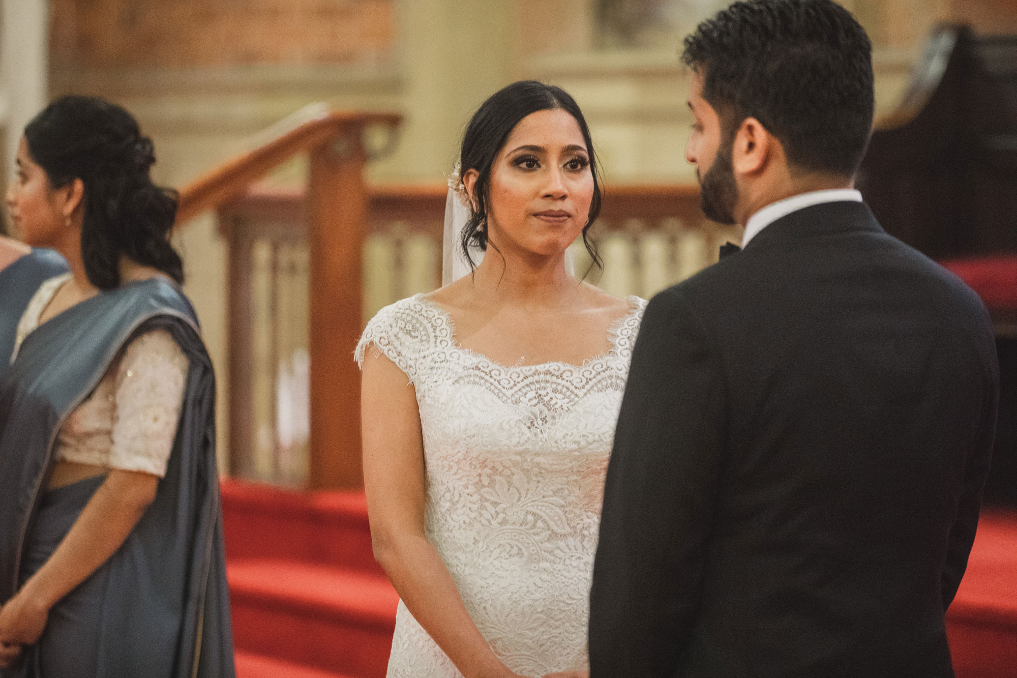 bride looking at the groom