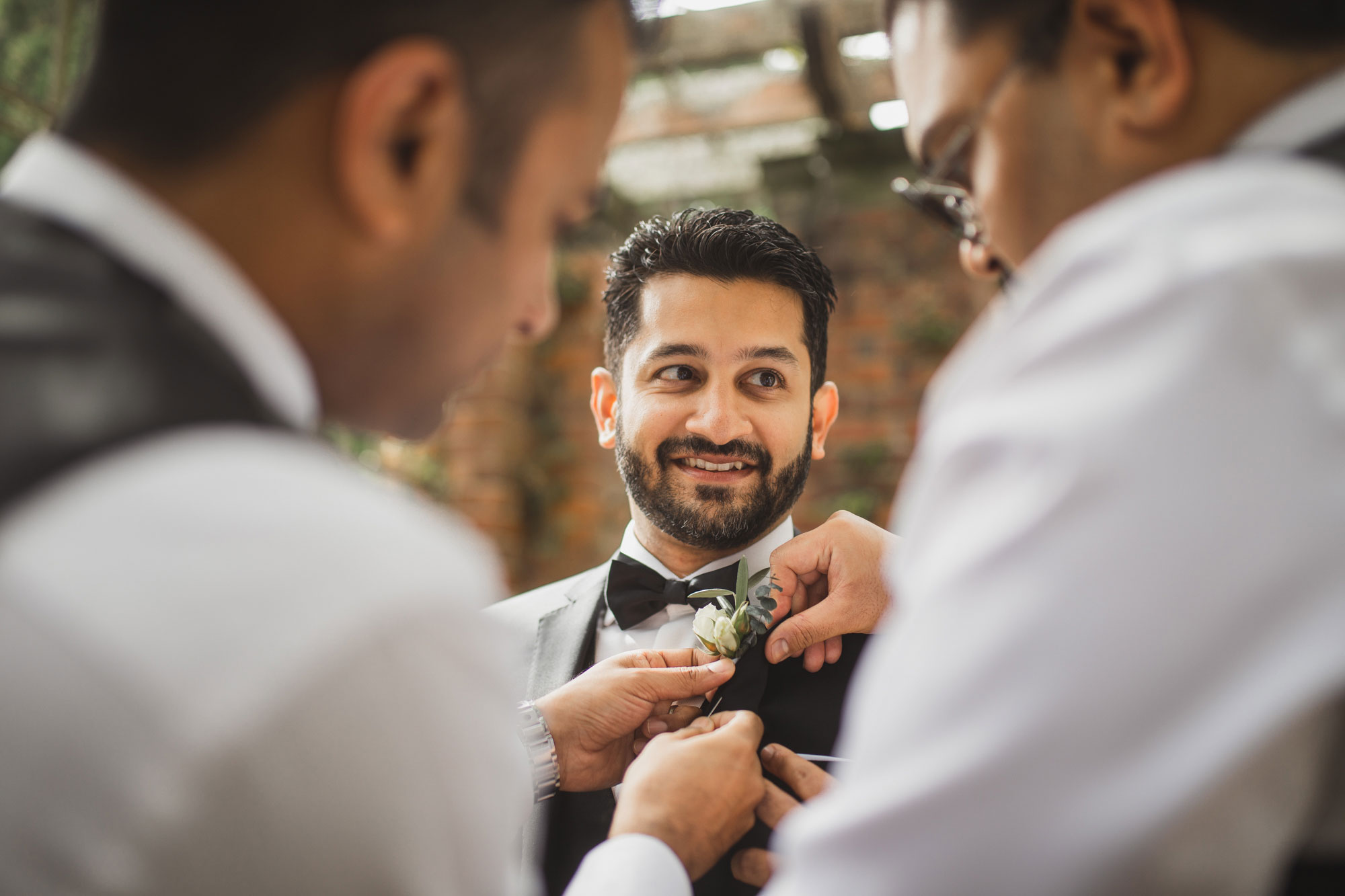 groom getting dressed