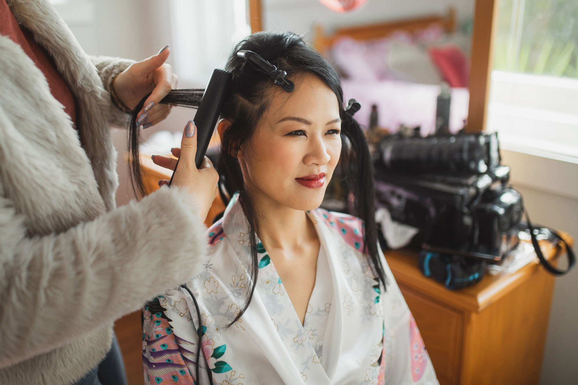 bride getting hair done