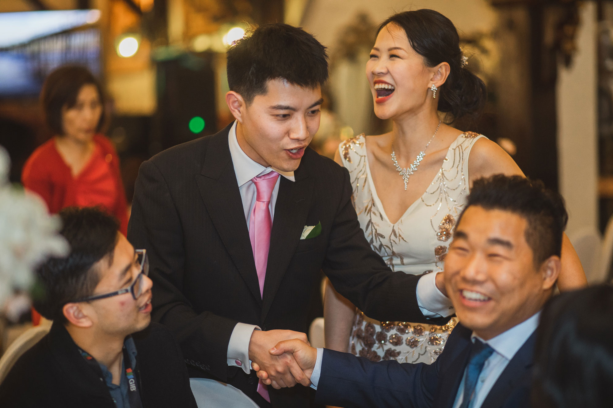 groom and bride laughing