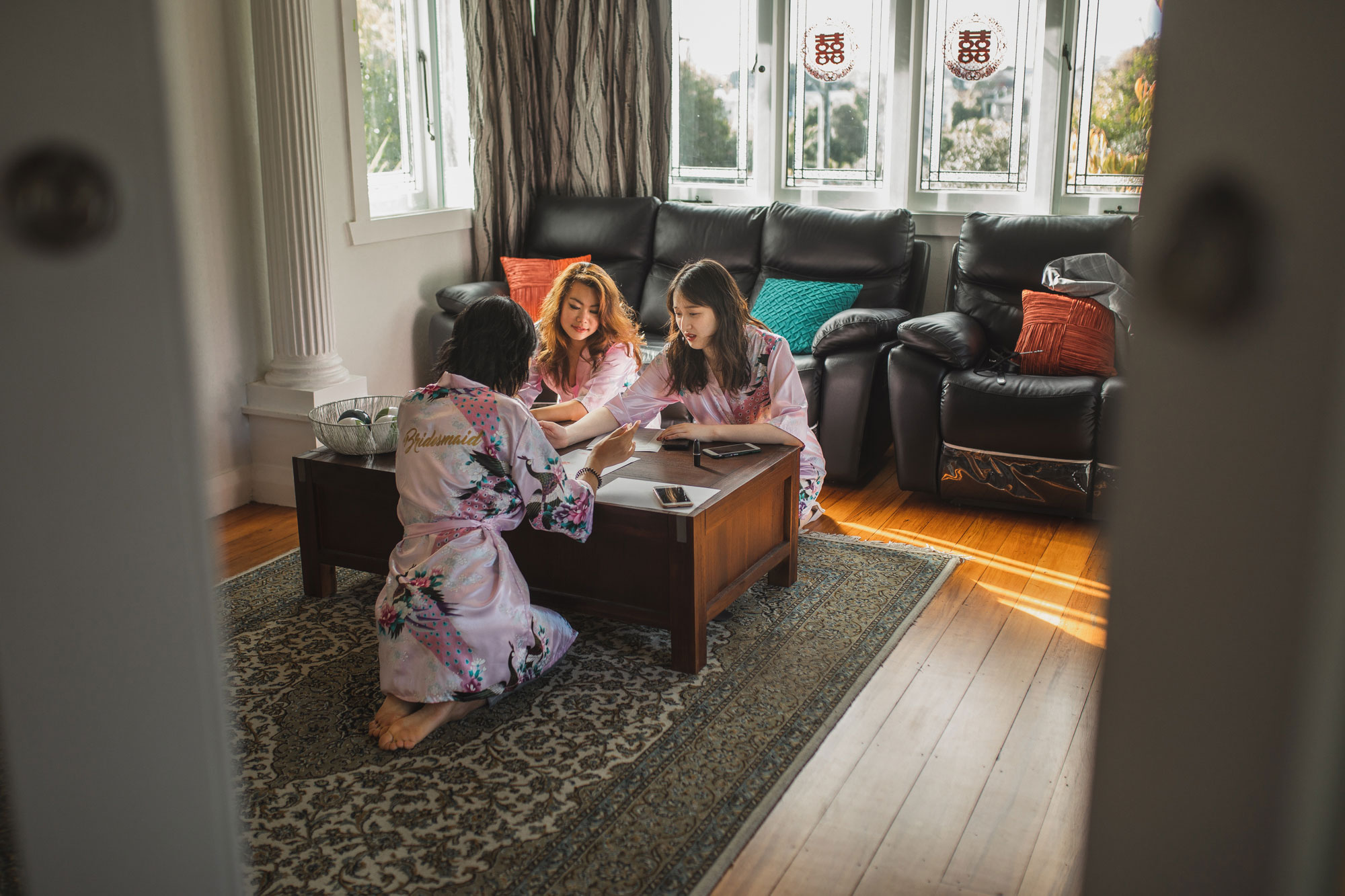 bridesmaids discussing in a room