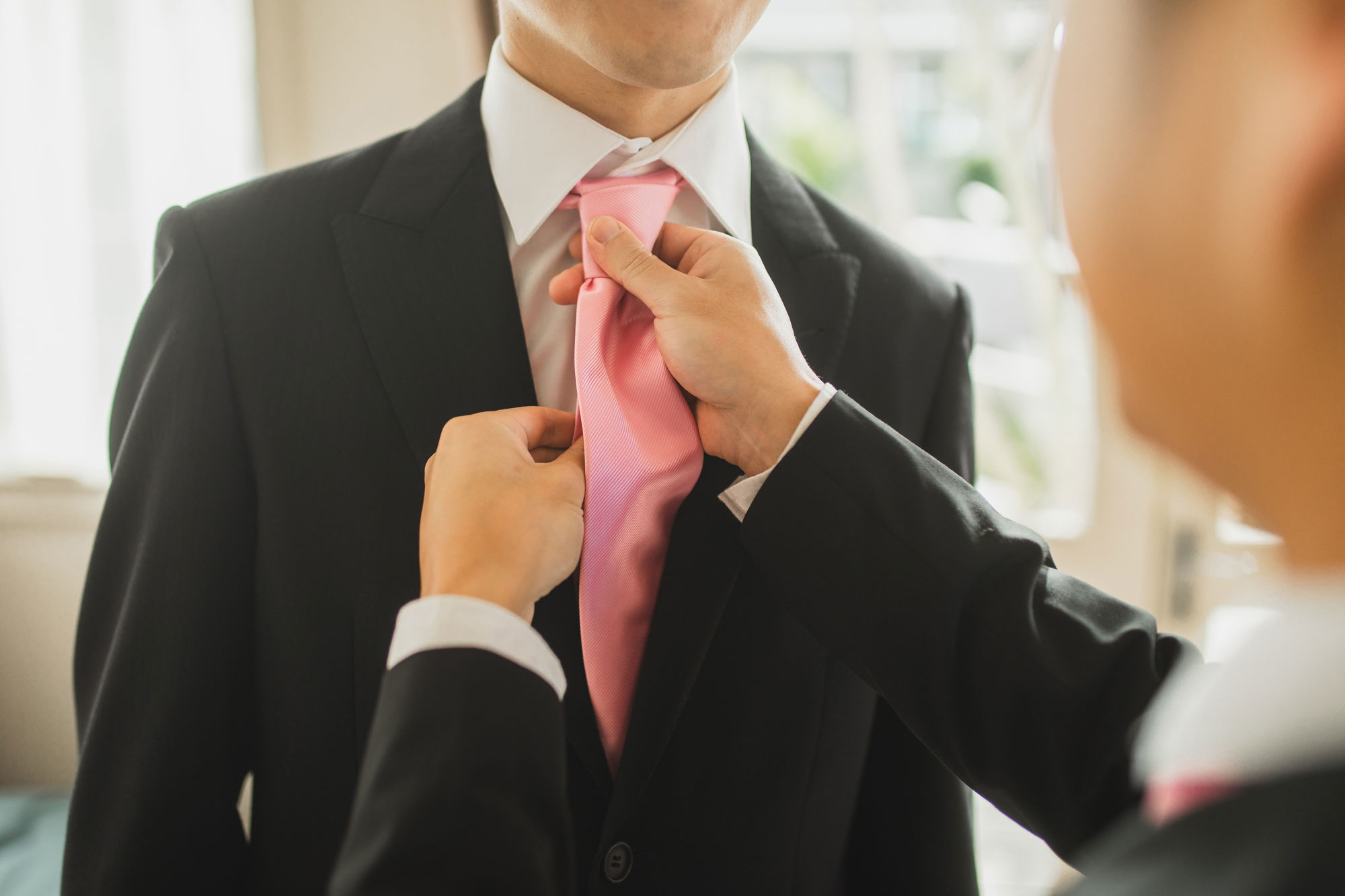 groom tie close up