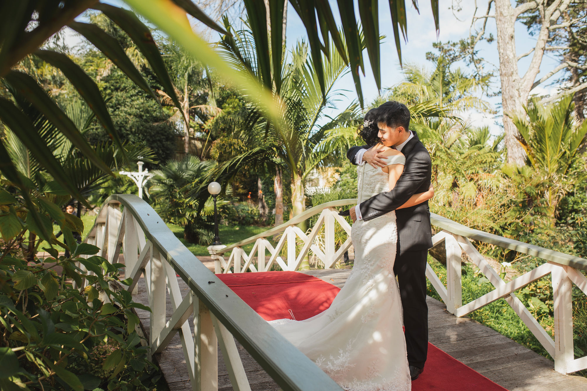 bride and groom embrace