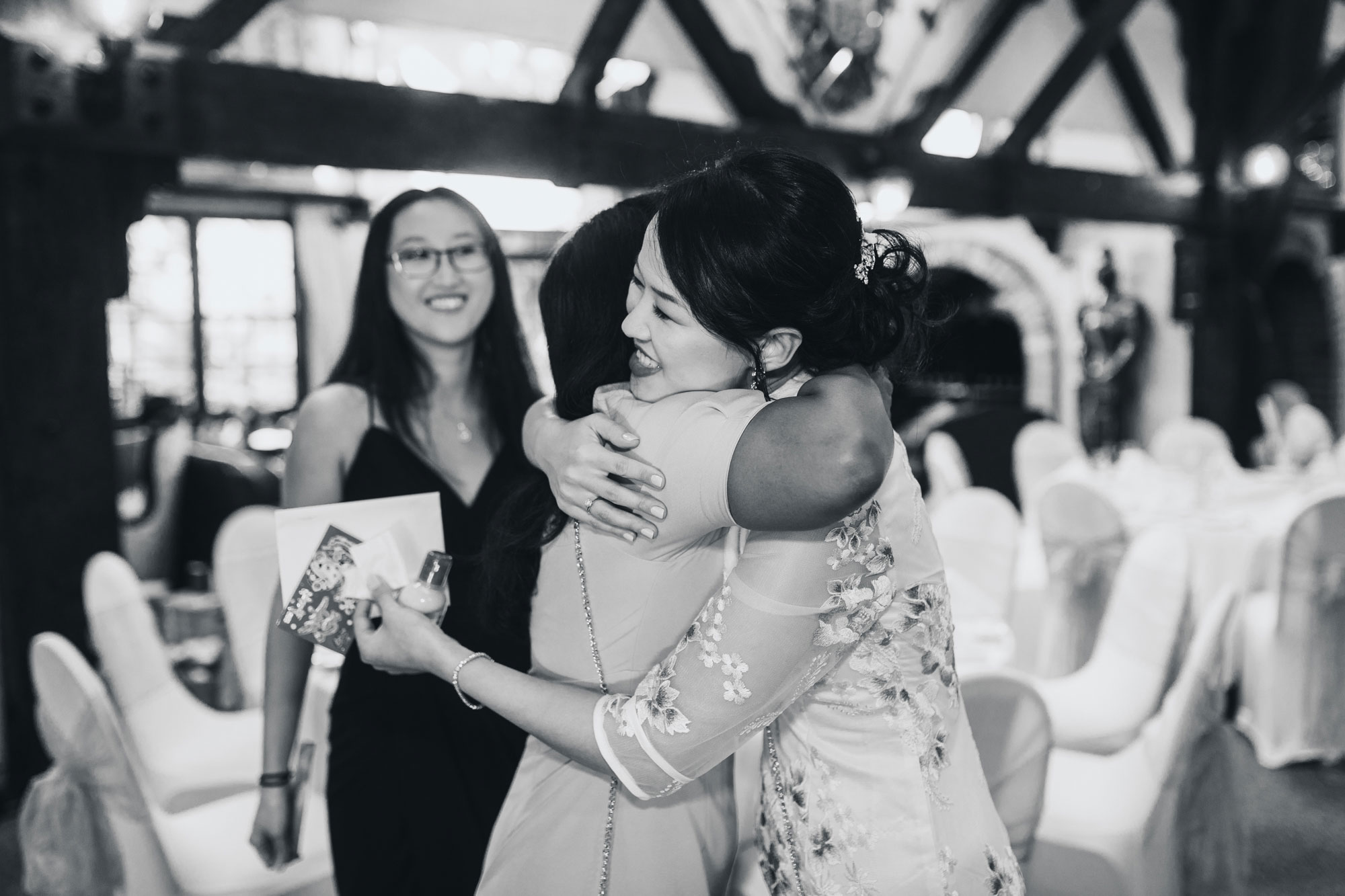 bride hugging guest