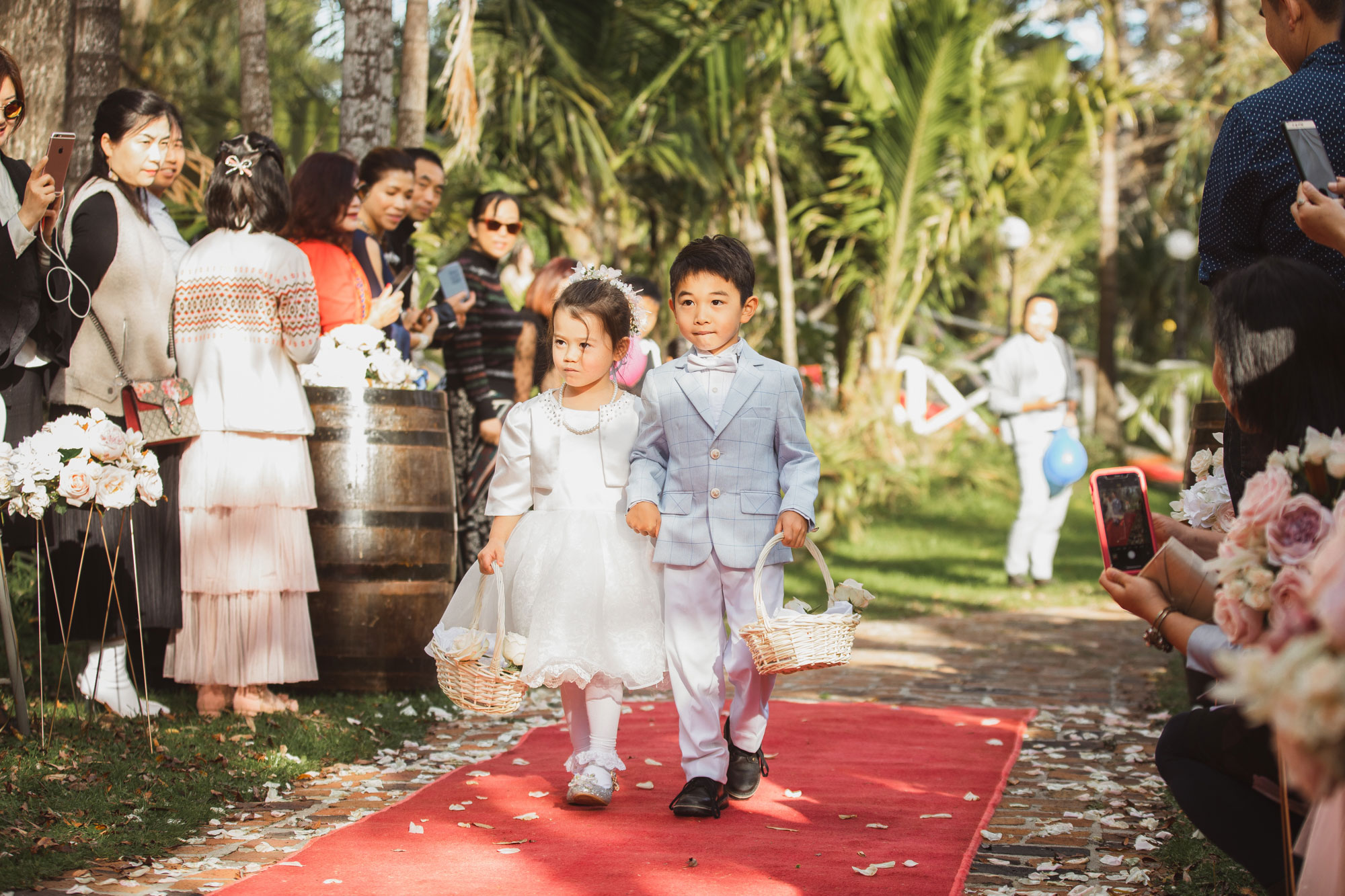 flower girl and page boy walking