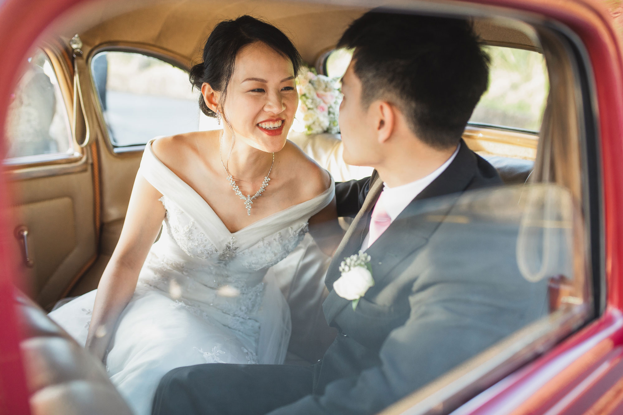 bride and groom car