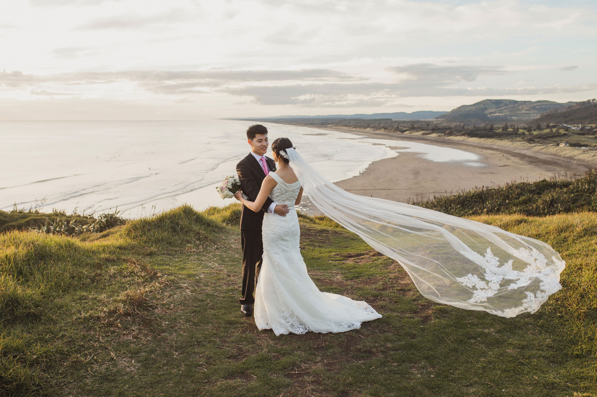 bridal photo at muriwai beach