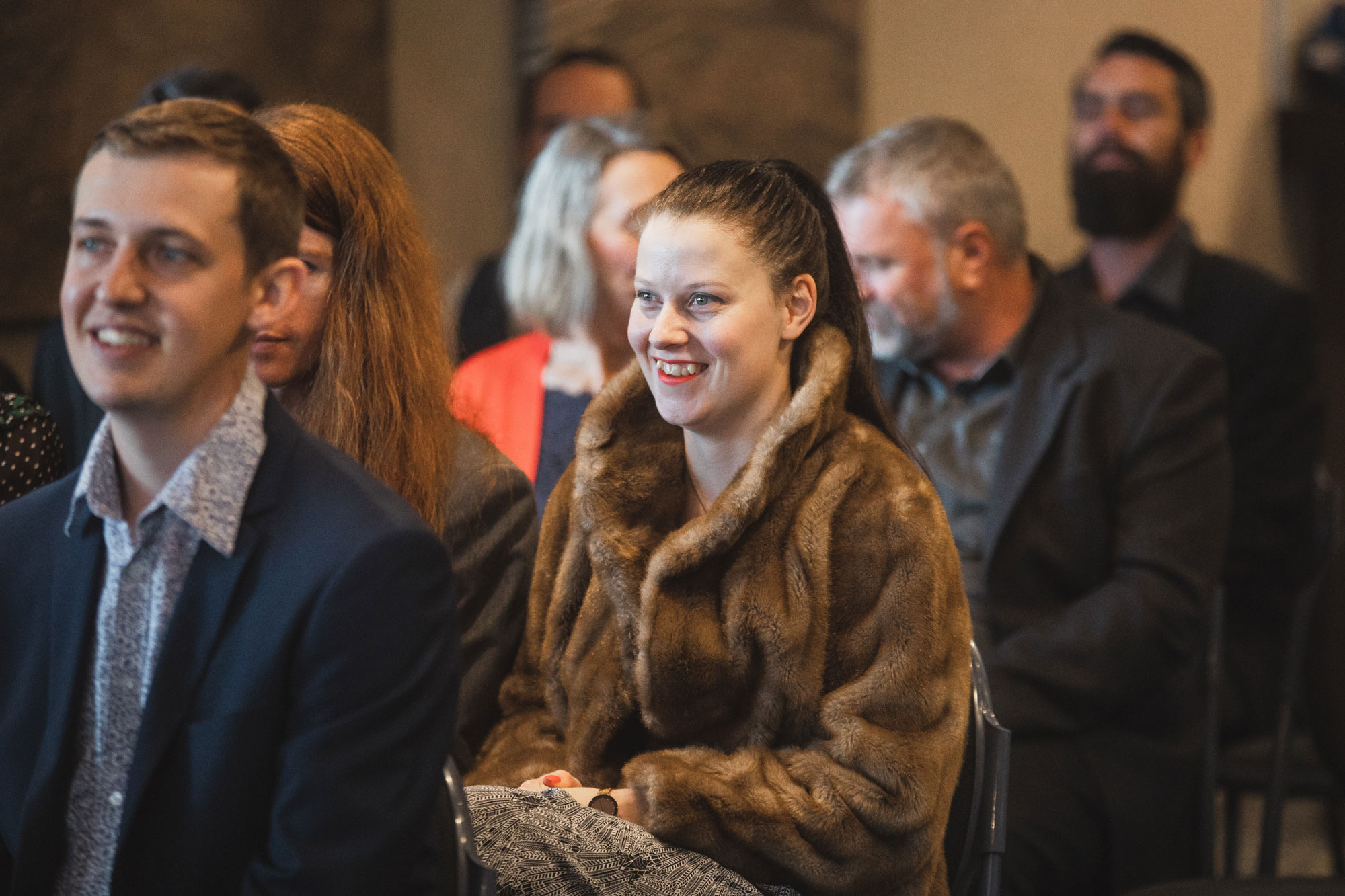 wedding guests smiling