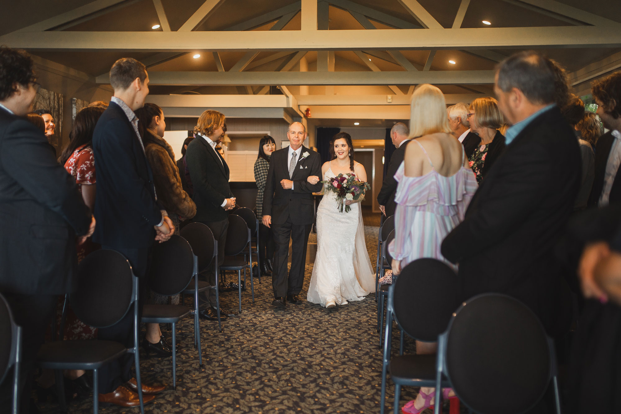 bride and father walking down the aisle