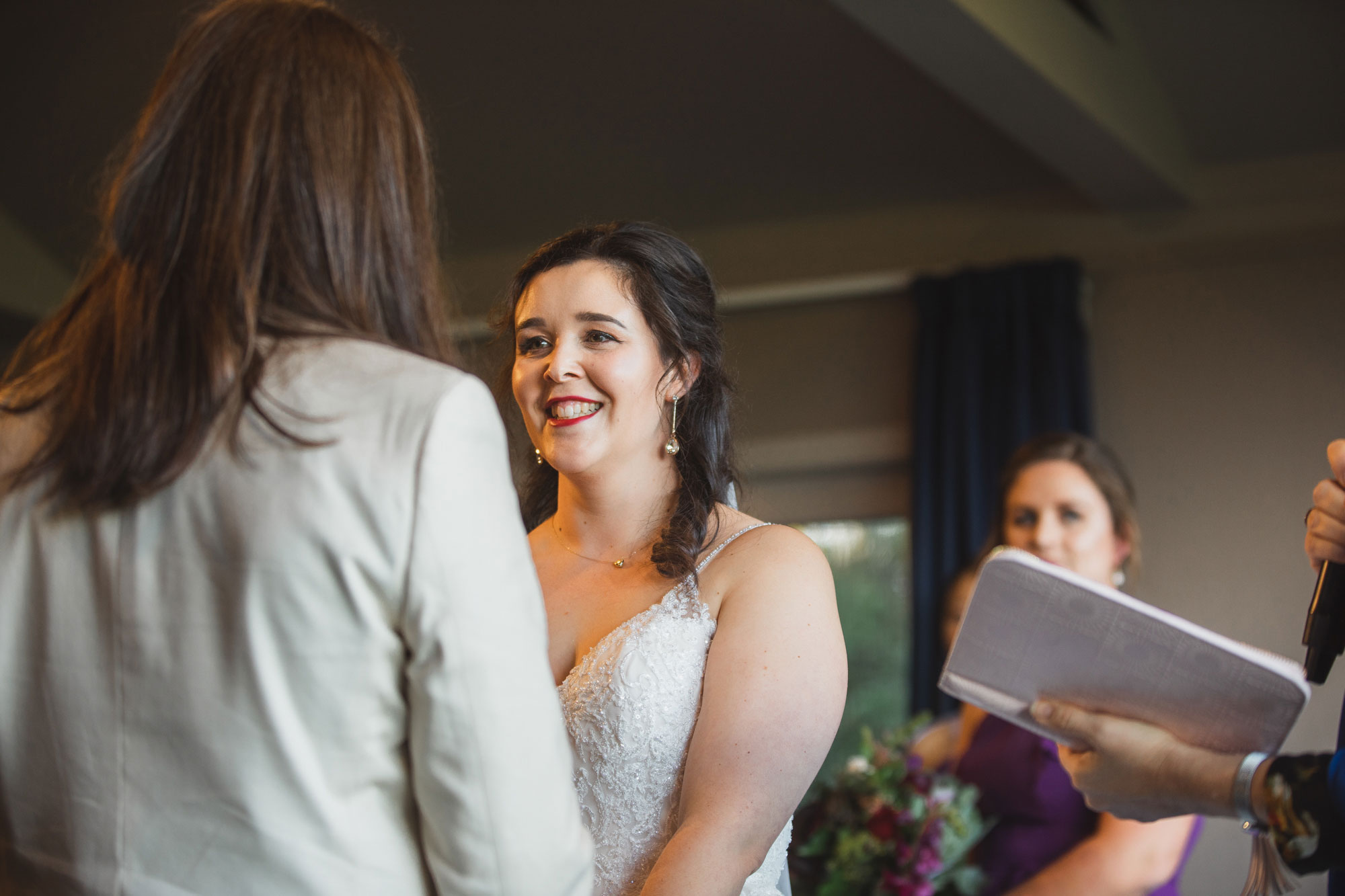 bride looking at the groom